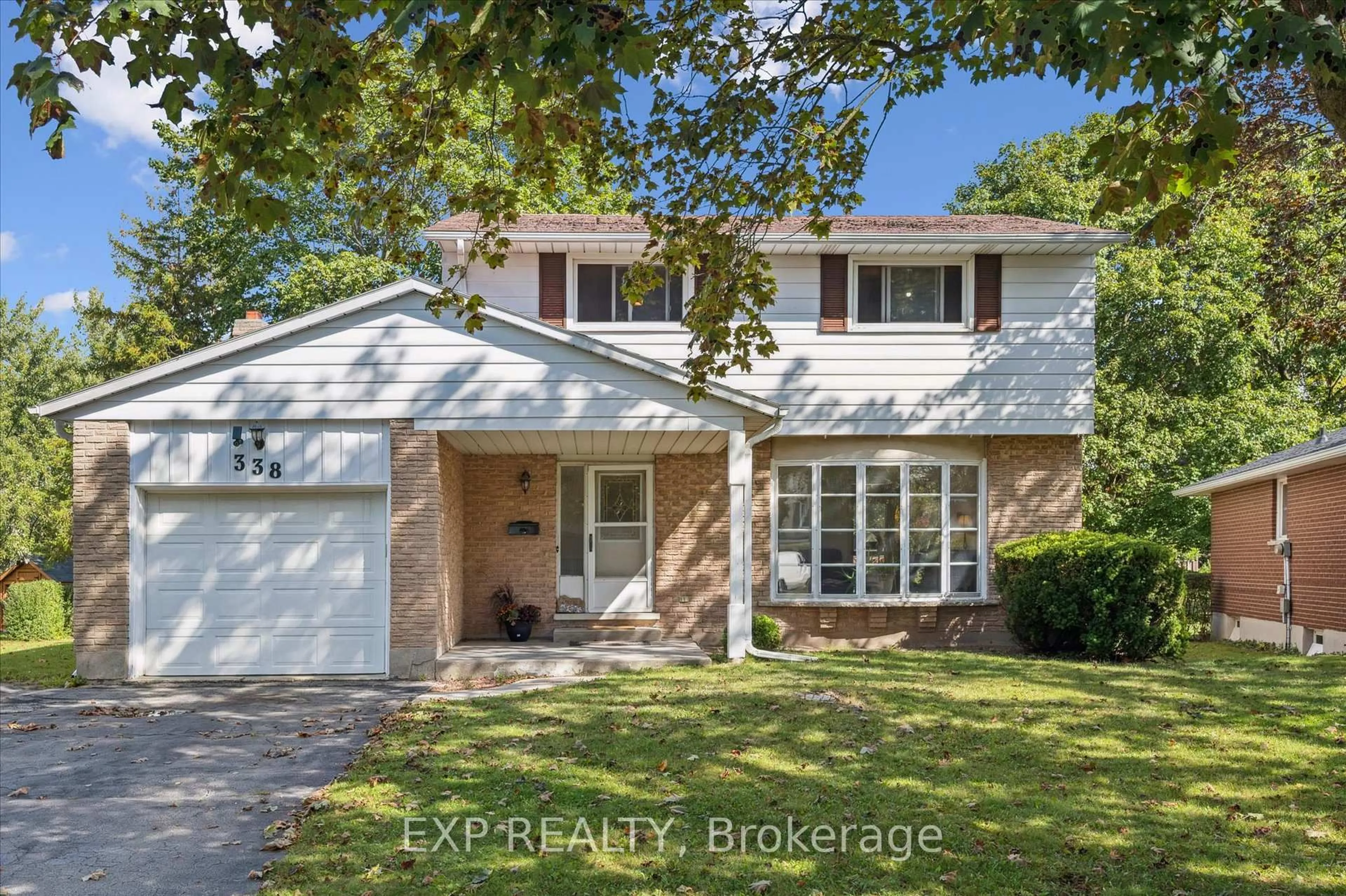 Home with brick exterior material, street for 338 Ascot Pl, Waterloo Ontario N2J 3V8