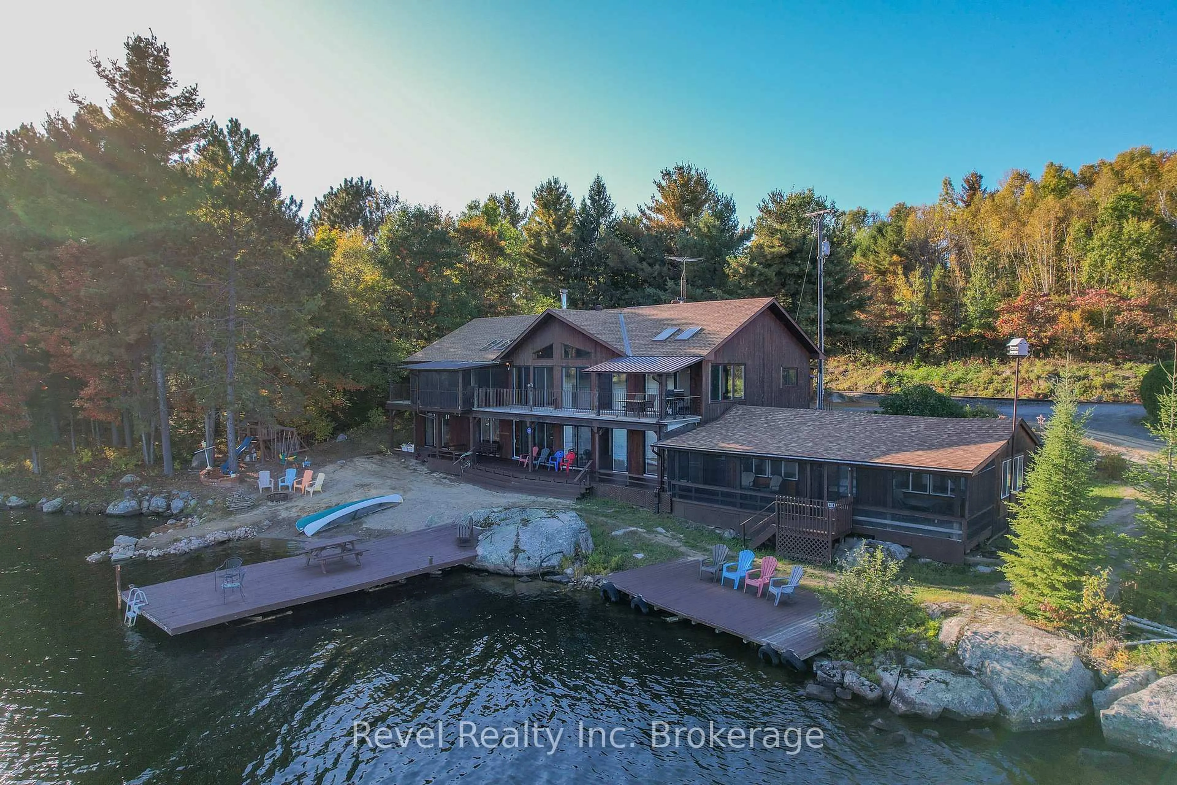 A pic from outside/outdoor area/front of a property/back of a property/a pic from drone, water/lake/river/ocean view for 280 Sunnyside Rd, Bonfield Ontario P0H 1E0