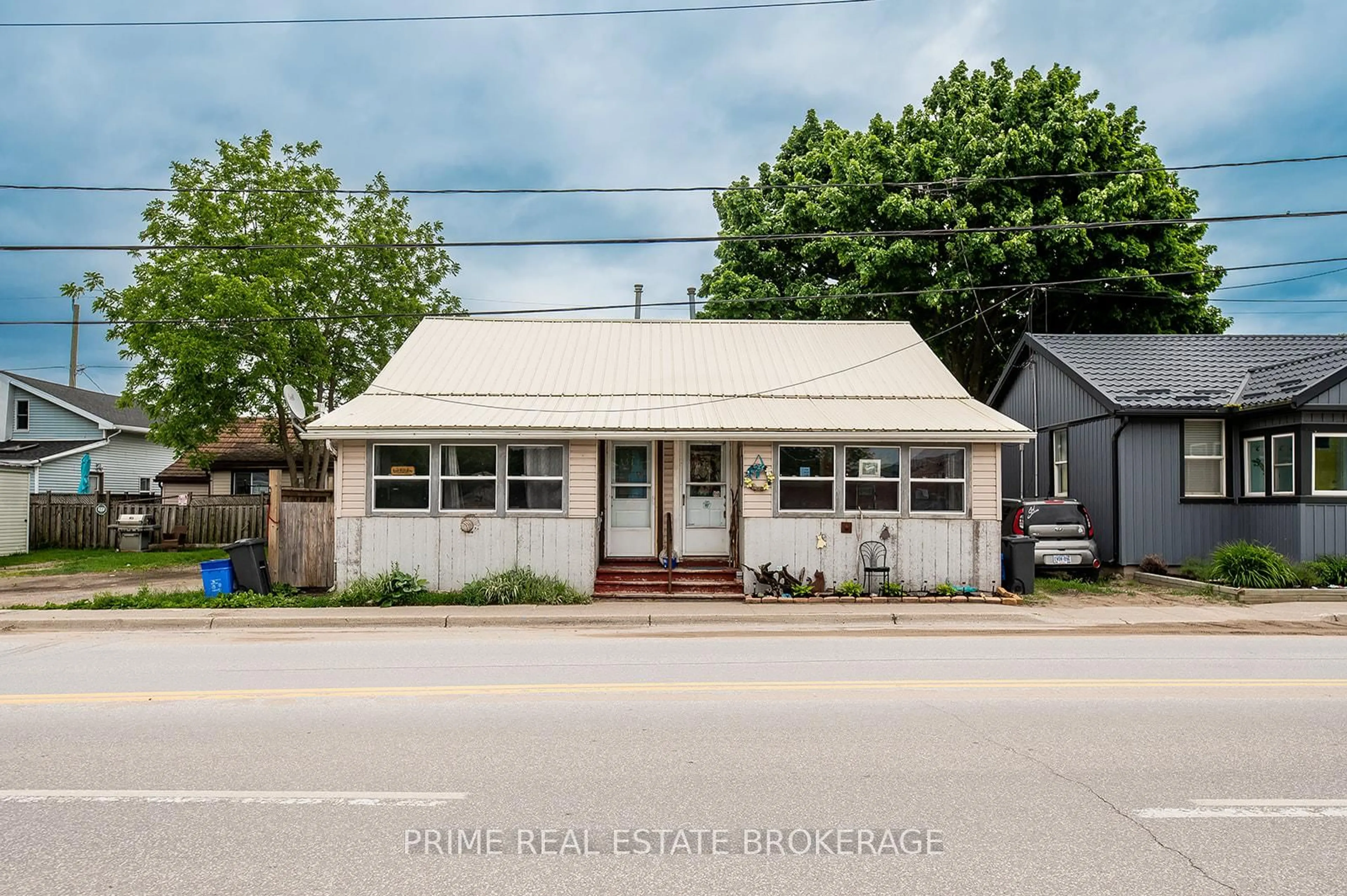 Home with vinyl exterior material, street for 151 William St, Central Elgin Ontario N5L 1E4