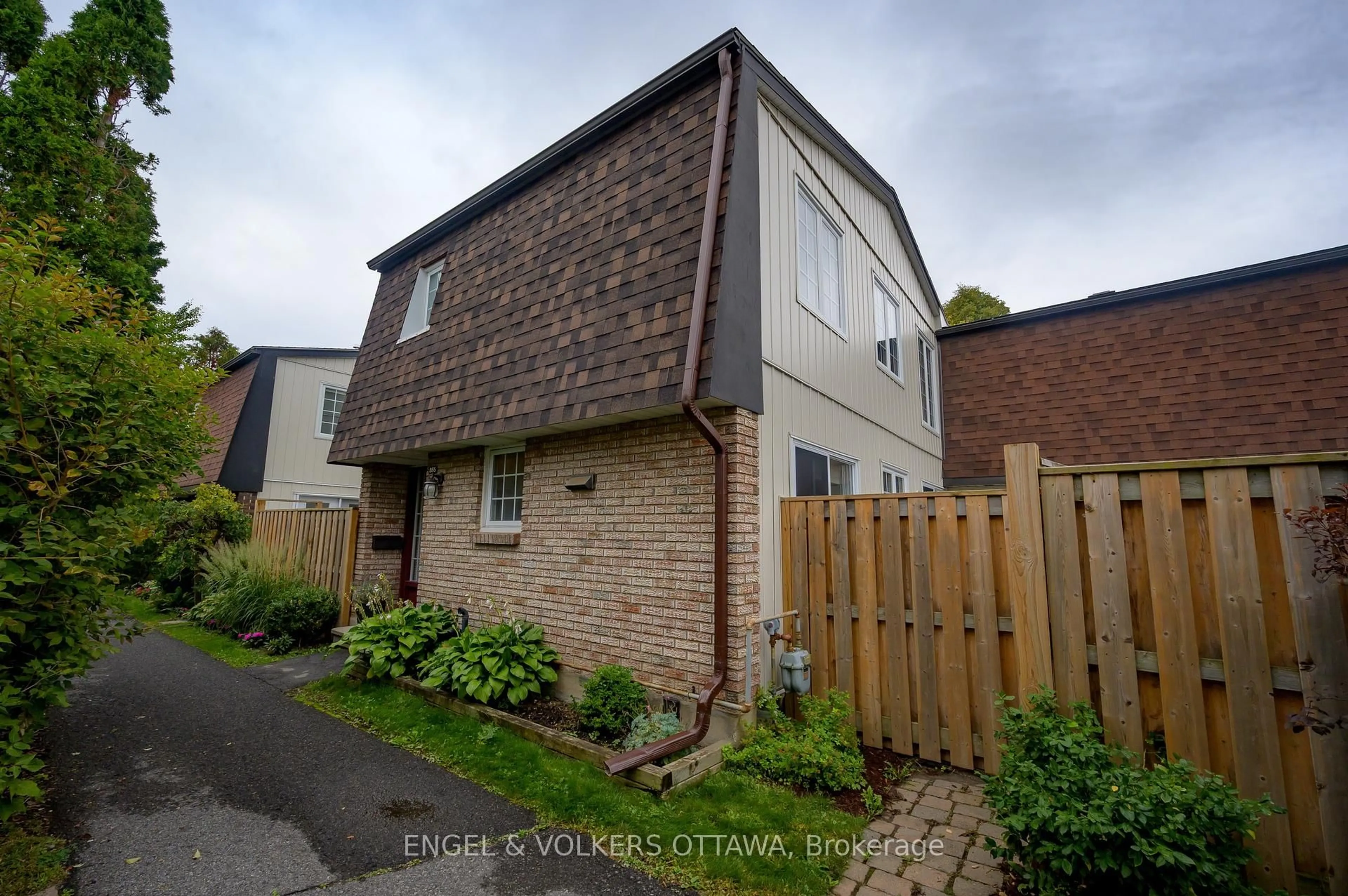 A pic from outside/outdoor area/front of a property/back of a property/a pic from drone, street for 355 Kintyre Private, Ottawa Ontario K2C 3M6