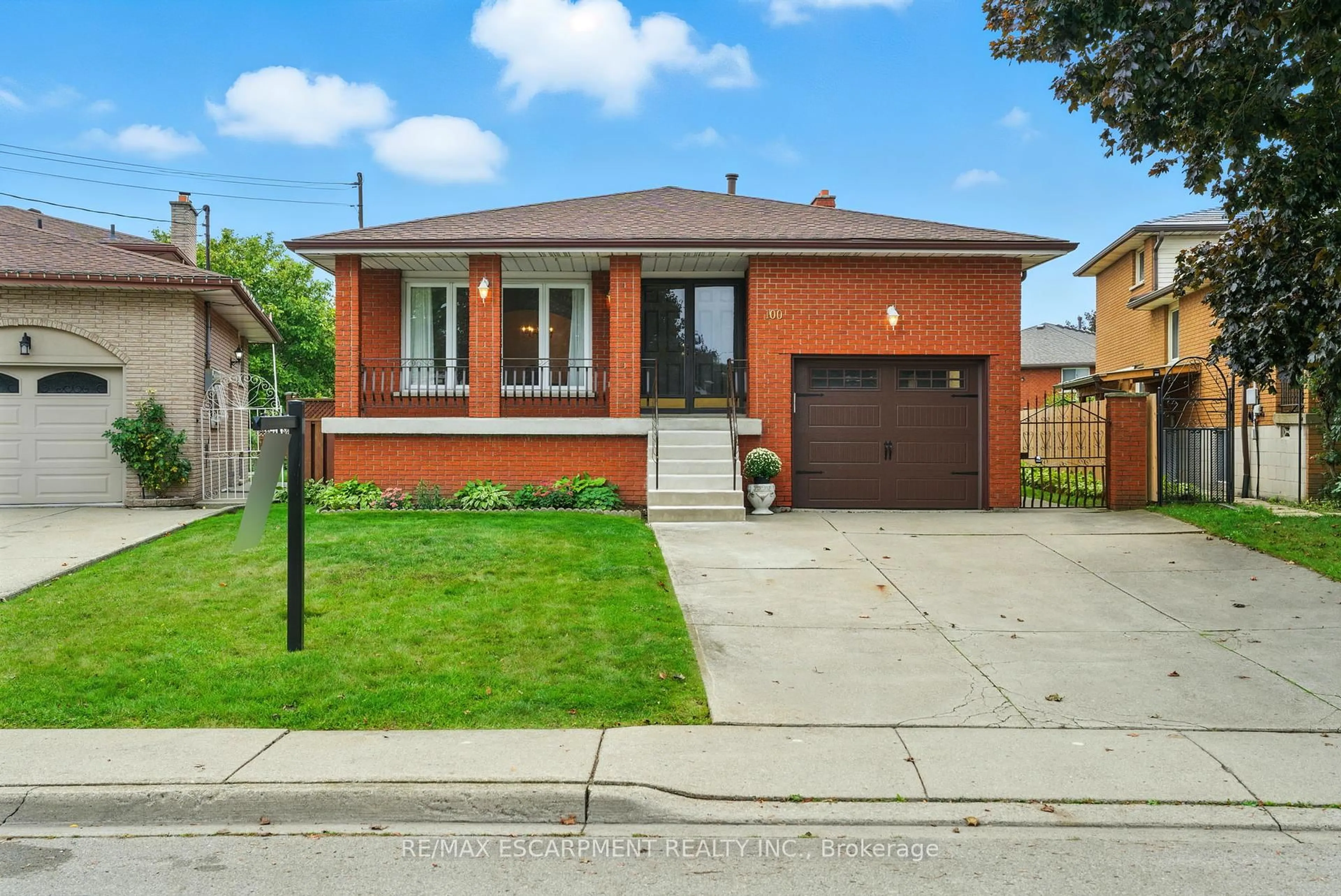 Home with brick exterior material, street for 100 Taymall St, Hamilton Ontario L8W 1Z4