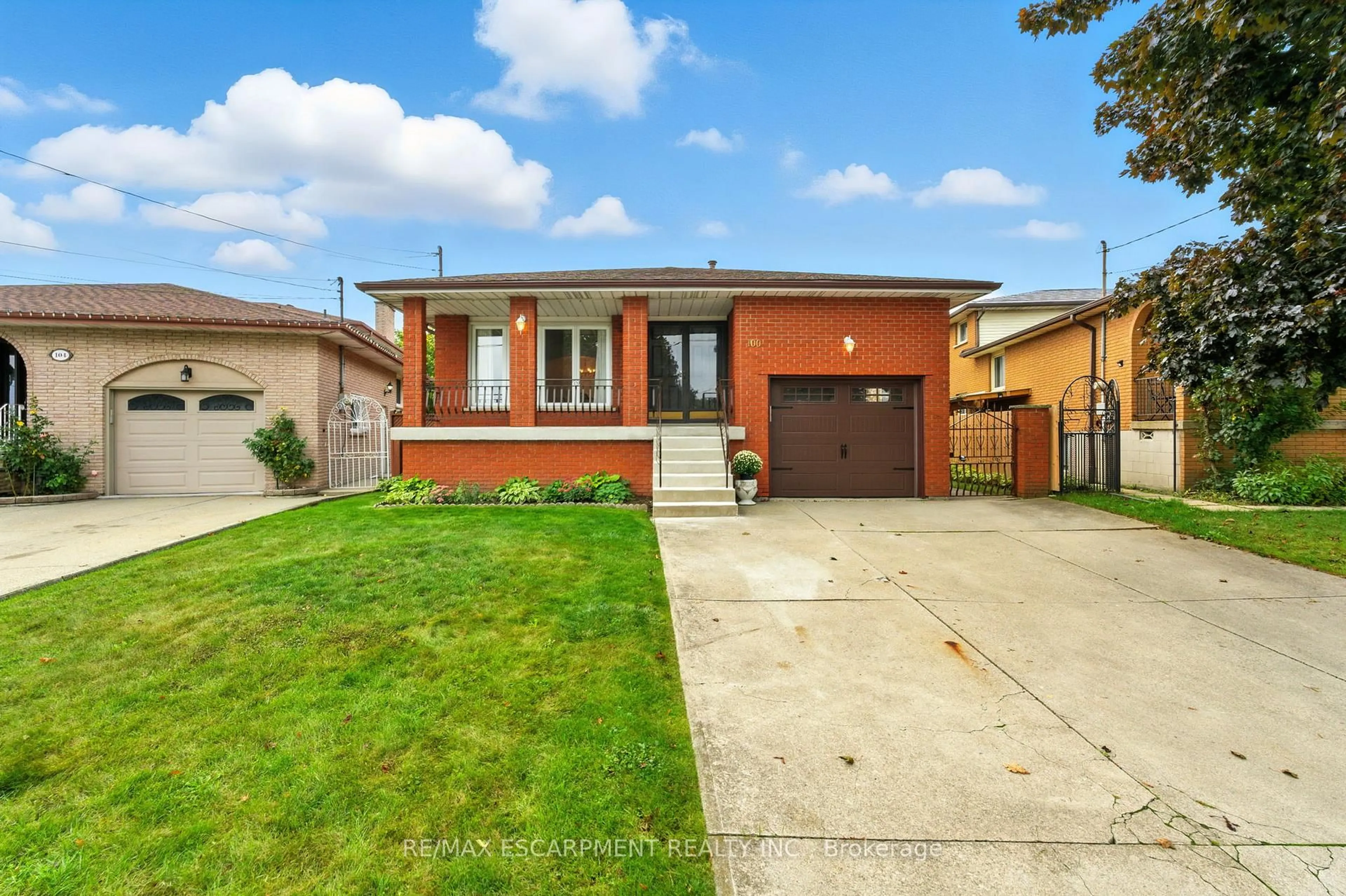 Home with brick exterior material, street for 100 Taymall St, Hamilton Ontario L8W 1Z4