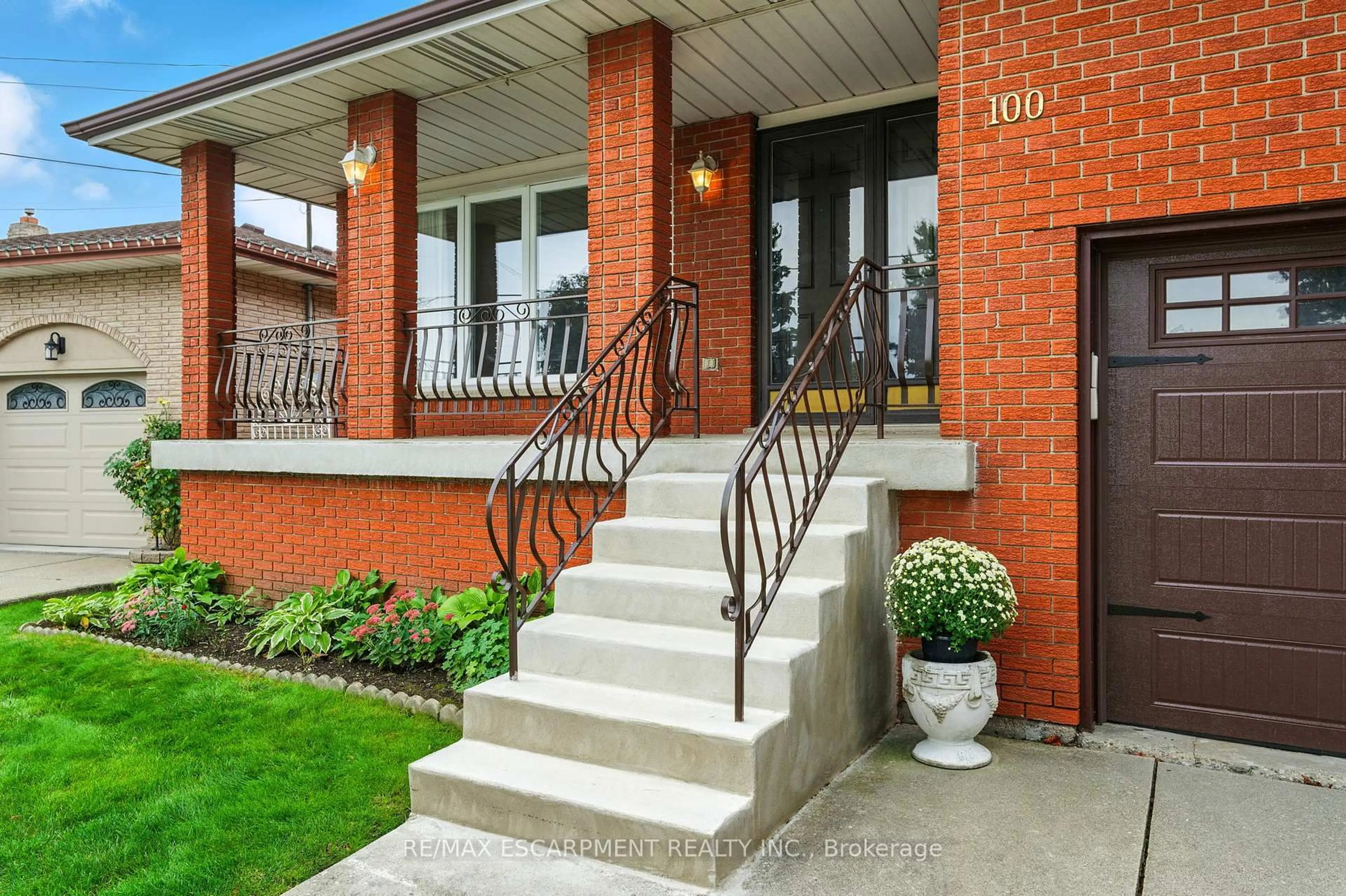 Home with brick exterior material, street for 100 Taymall St, Hamilton Ontario L8W 1Z4