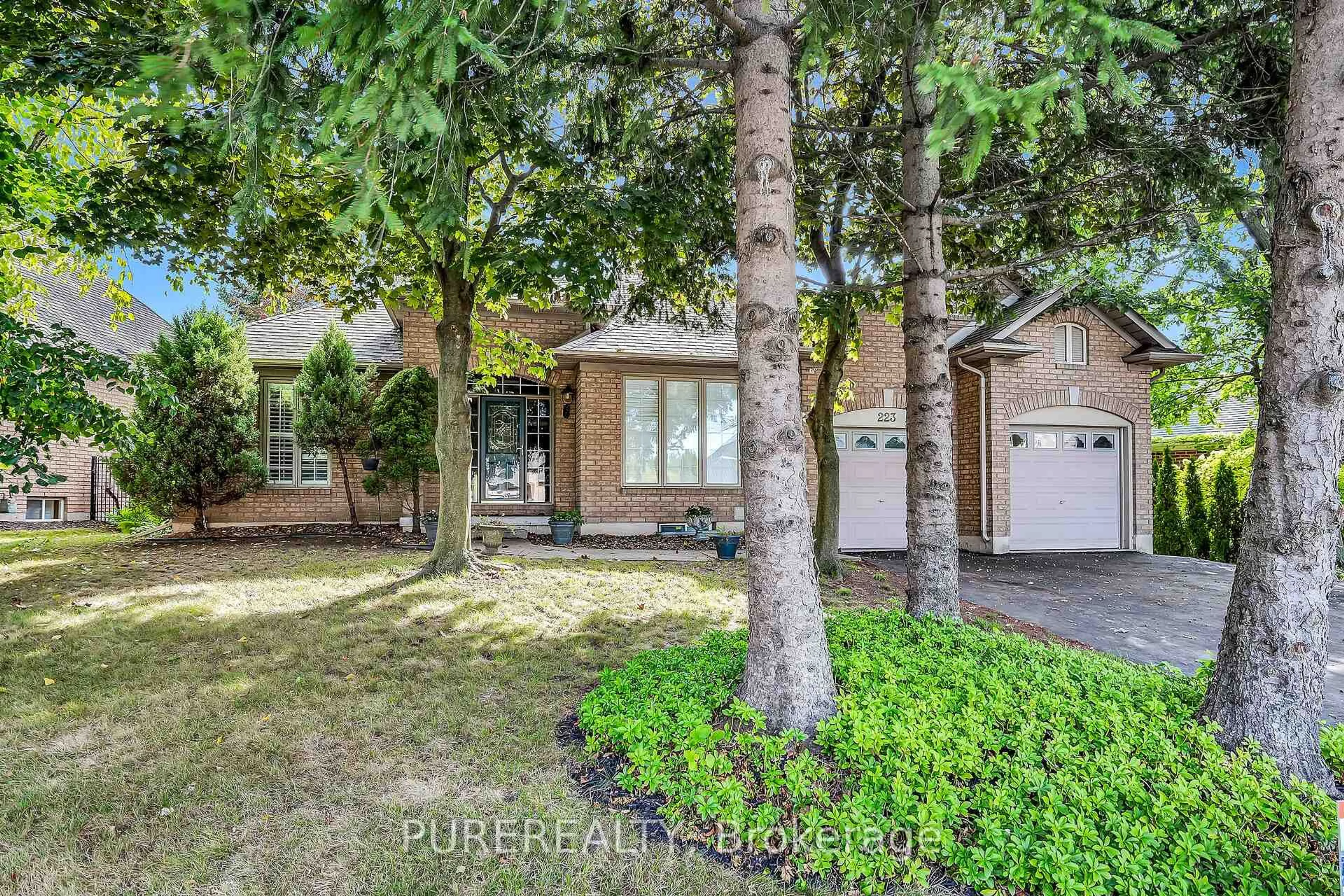 Home with brick exterior material, street for 223 Greenbriar Rd, Hamilton Ontario L9G 3V9