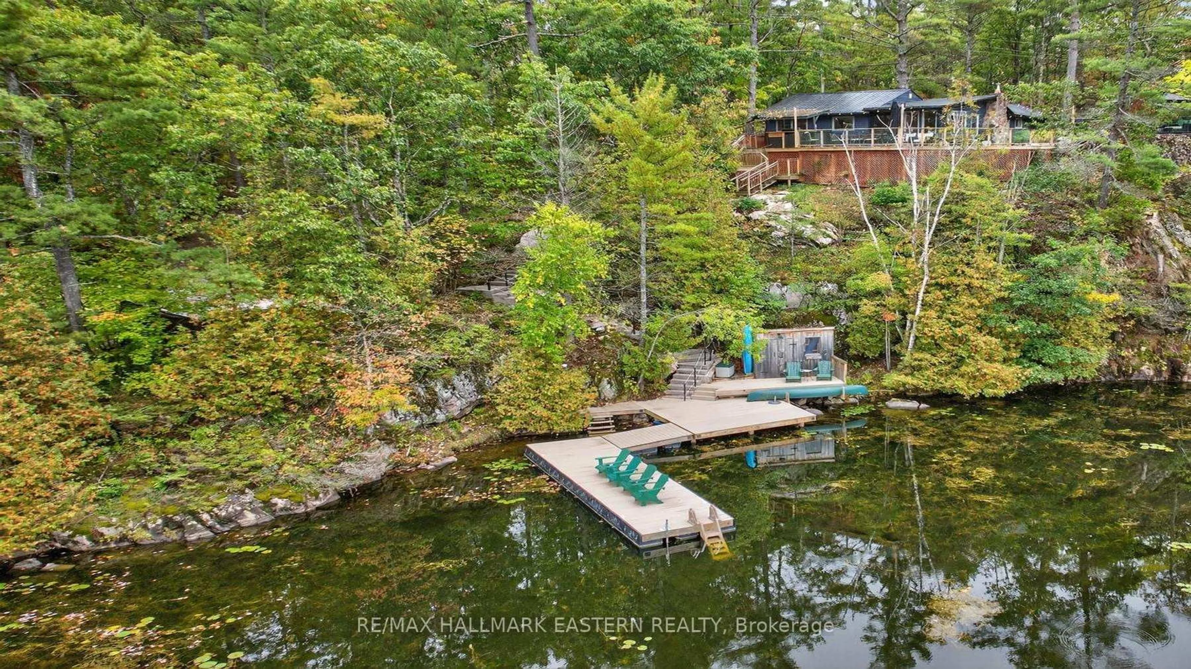 A pic from outside/outdoor area/front of a property/back of a property/a pic from drone, water/lake/river/ocean view for 2712 Channel View Lane, Selwyn Ontario K0L 2H0
