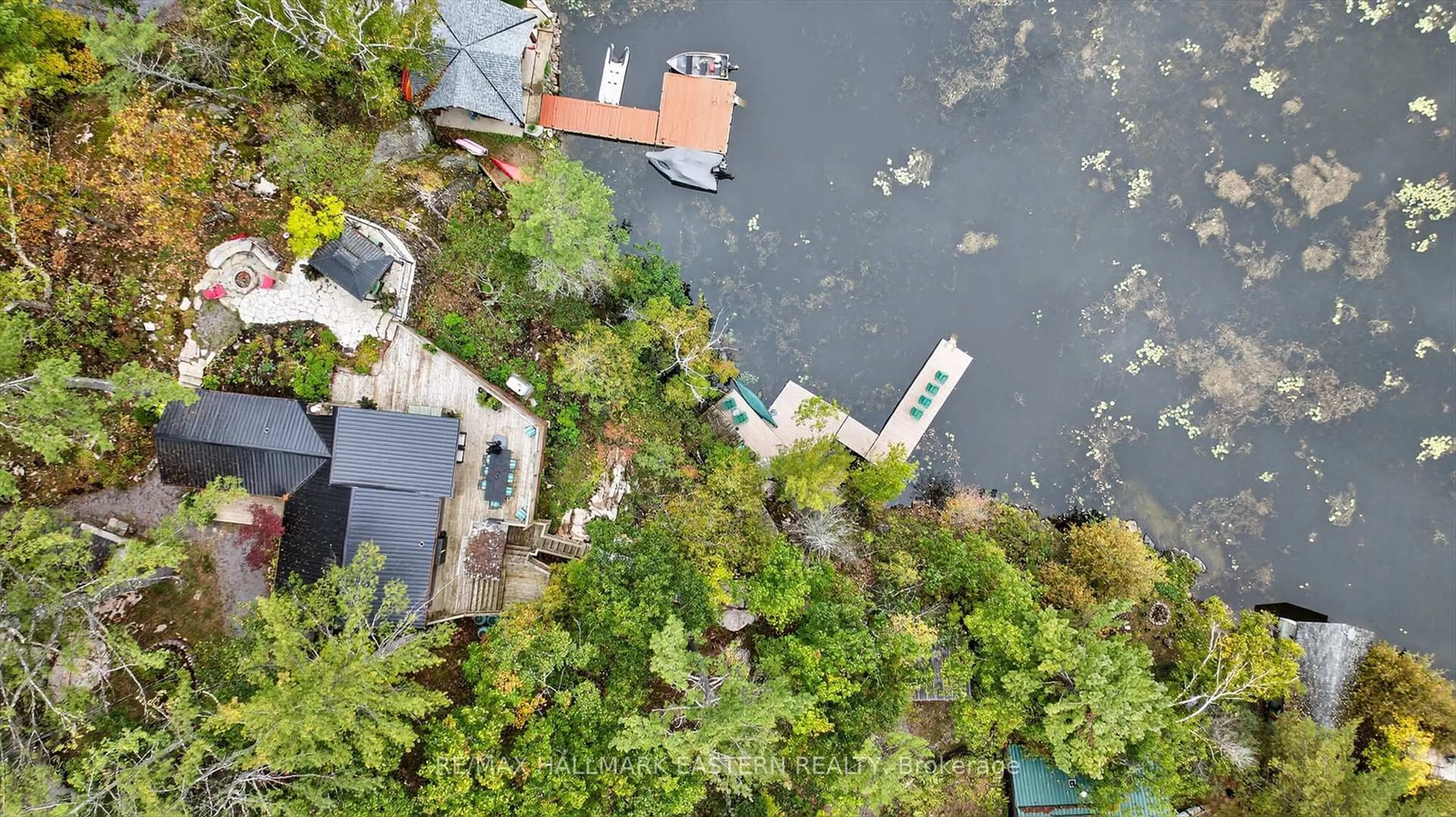 A pic from outside/outdoor area/front of a property/back of a property/a pic from drone, water/lake/river/ocean view for 2712 Channel View Lane, Selwyn Ontario K0L 2H0