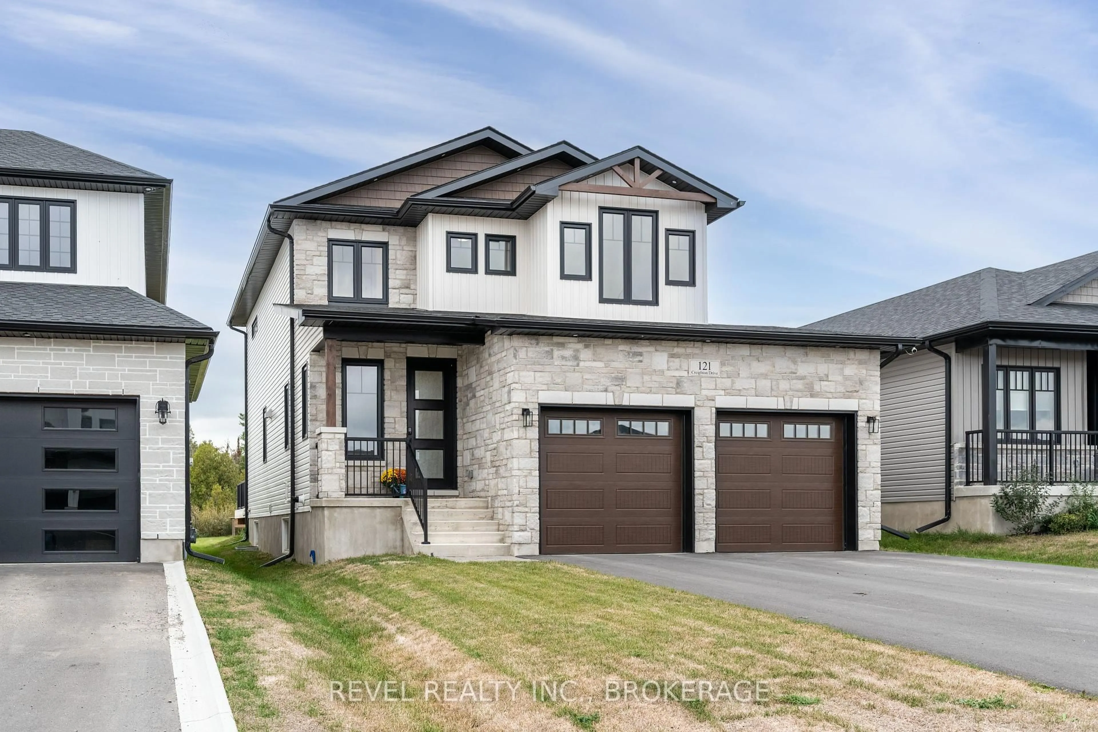 Home with brick exterior material, street for 121 Creighton Dr, Bissett Creek Ontario K0H 2H0