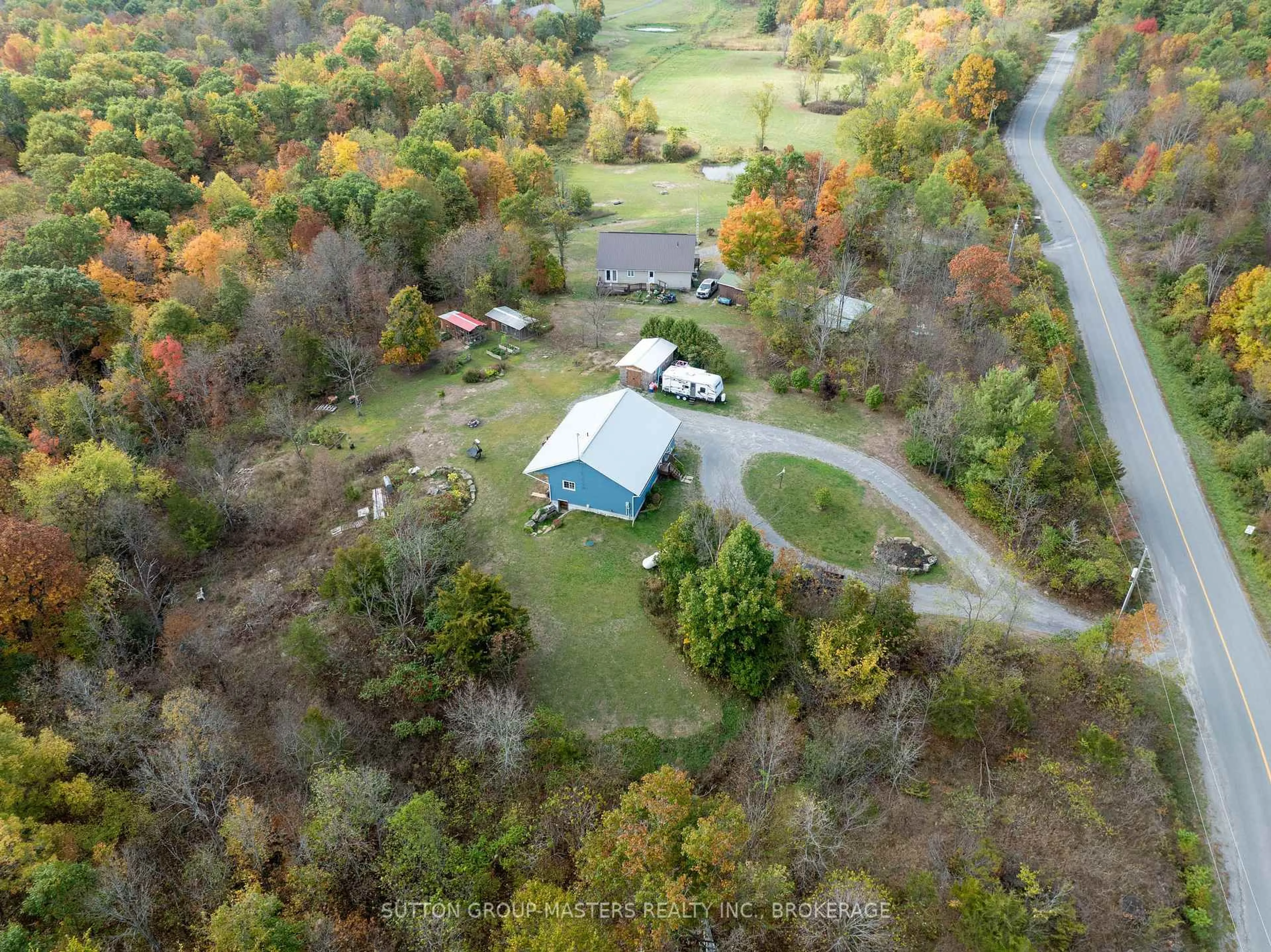 A pic from outside/outdoor area/front of a property/back of a property/a pic from drone, forest/trees view for 7908 Battersea Rd, Battersea Ontario K0H 1H0