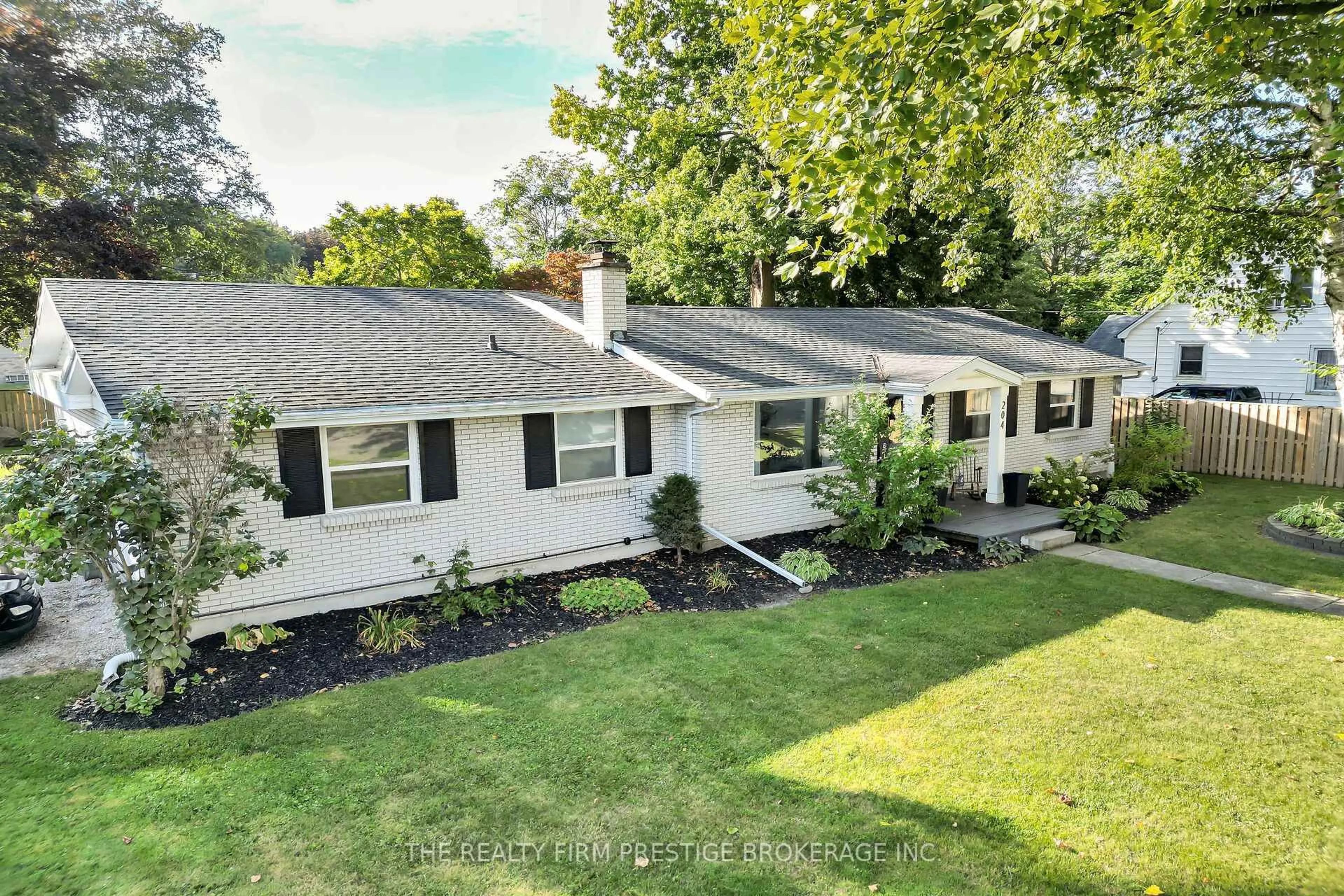 A pic from outside/outdoor area/front of a property/back of a property/a pic from drone, street for 204 Main St, West Elgin Ontario N0L 2P0