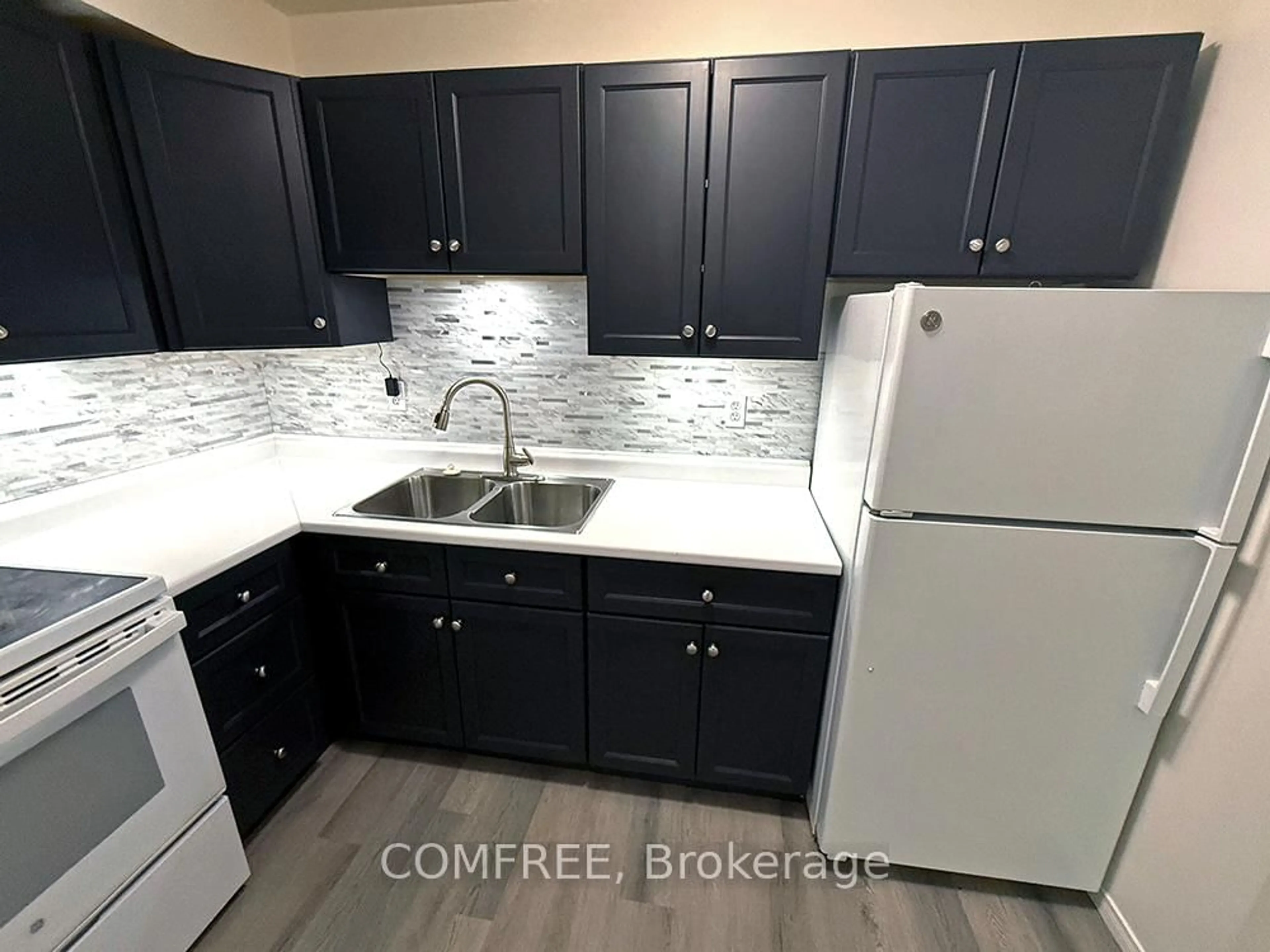 Standard kitchen, ceramic/tile floor for 60 Hiawatha Rd #28, Woodstock Ontario N4T 1P3