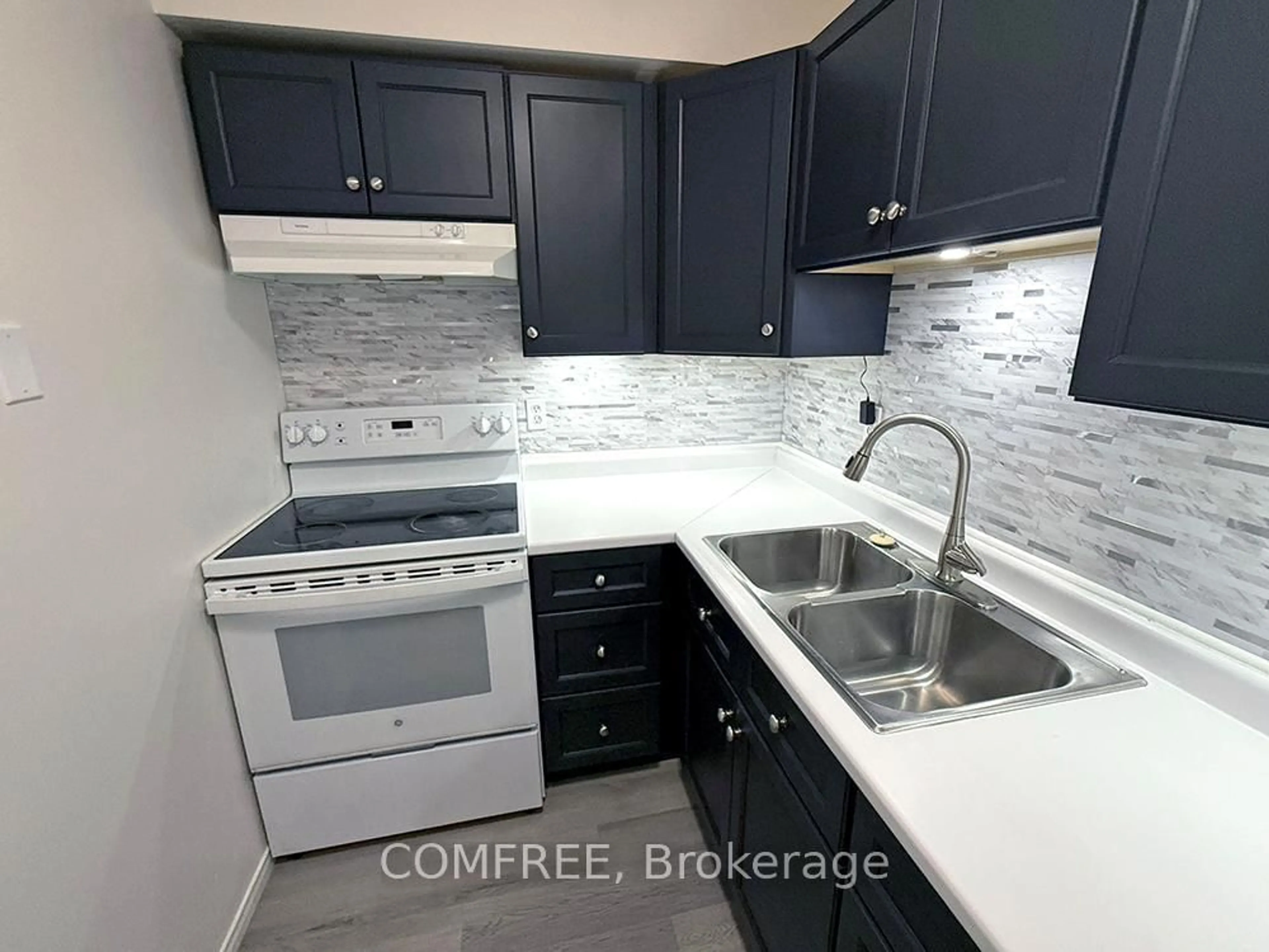 Standard kitchen, ceramic/tile floor for 60 Hiawatha Rd #28, Woodstock Ontario N4T 1P3