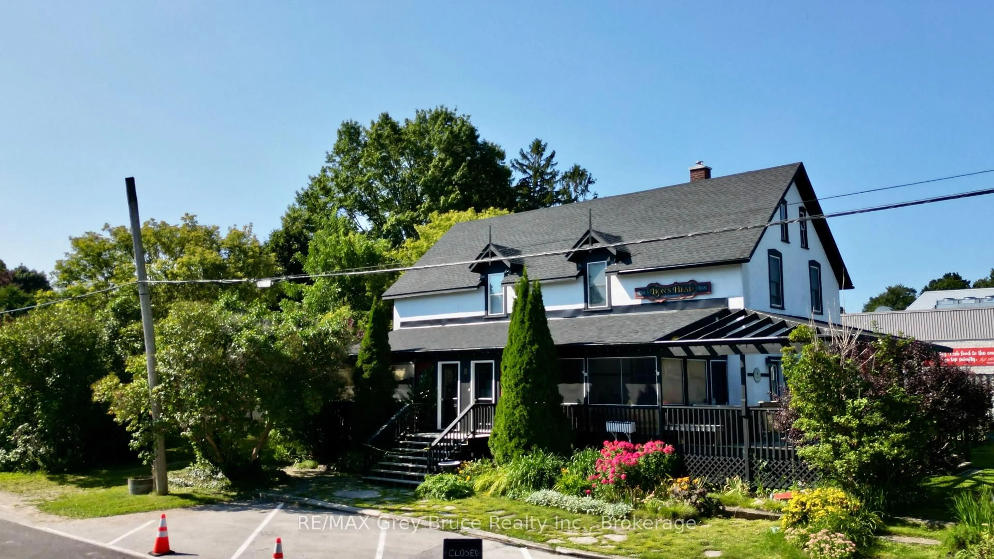 A pic from outside/outdoor area/front of a property/back of a property/a pic from drone, street for 8 Helen St, Northern Bruce Peninsula Ontario N0H 1W0