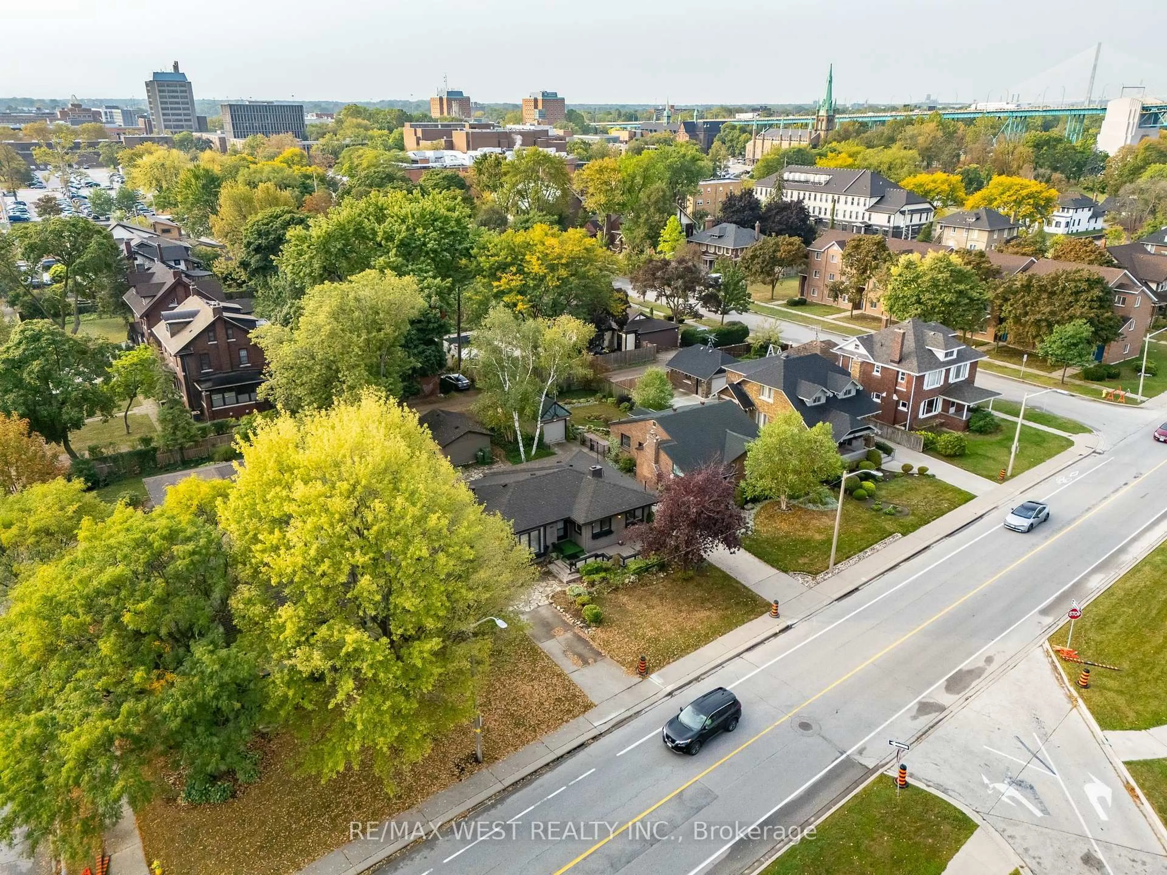 A pic from outside/outdoor area/front of a property/back of a property/a pic from drone, street for 2437 Riverside Dr, Windsor Ontario N9B 1B2