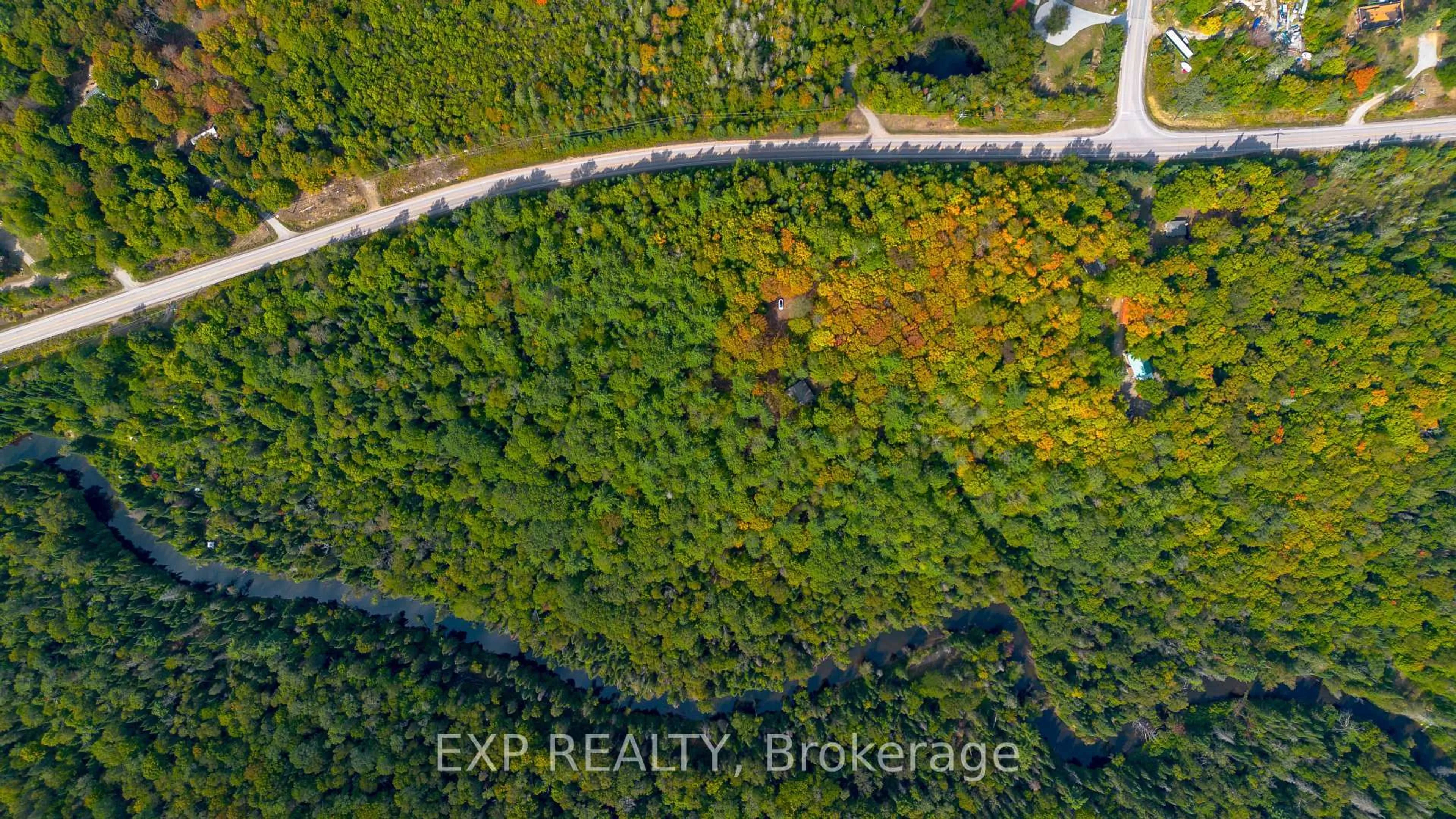 A pic from outside/outdoor area/front of a property/back of a property/a pic from drone, forest/trees view for 10282 County Road 503, Highlands East Ontario K0M 1R0