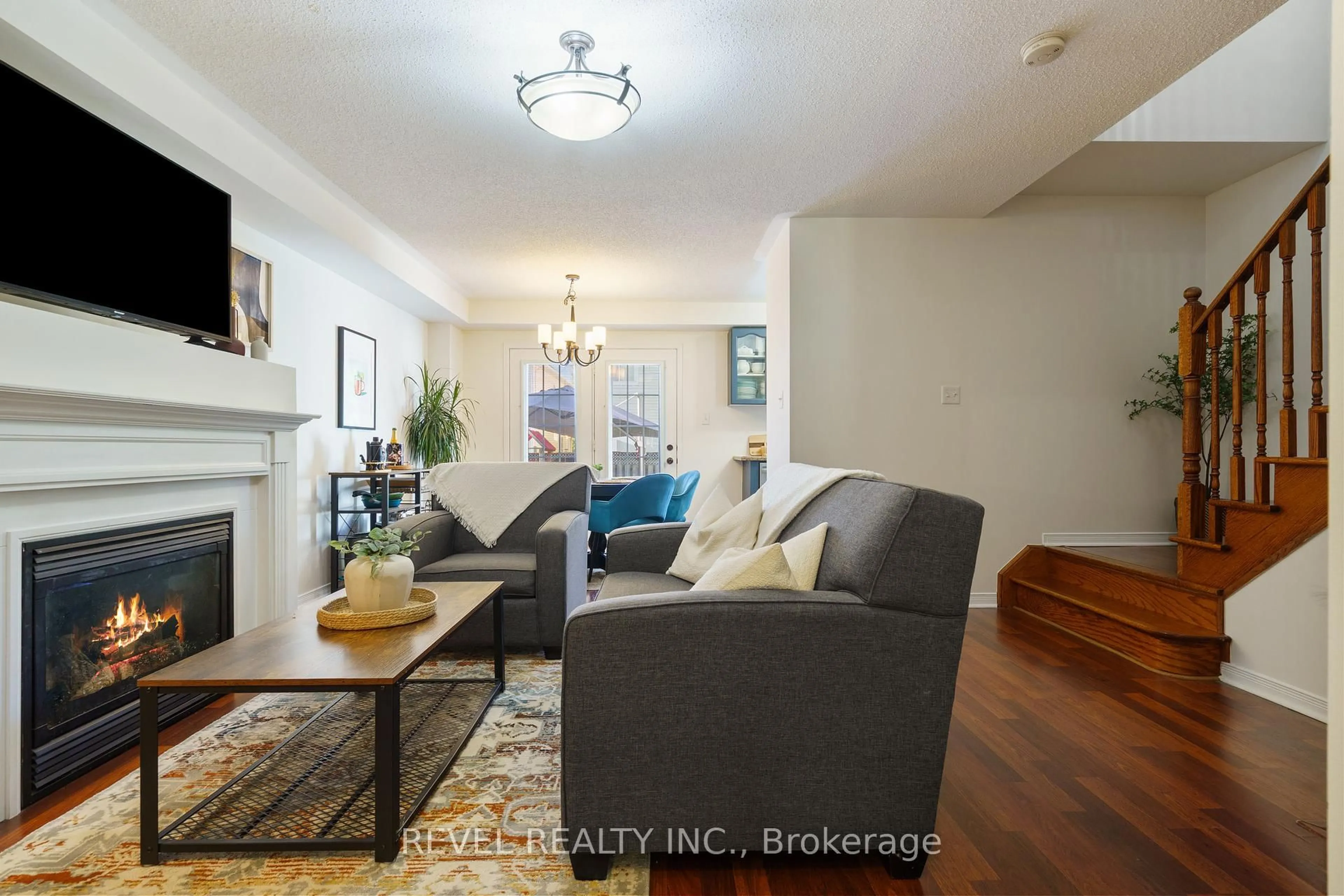 Living room with furniture, wood/laminate floor for 14 Fox Ru, Hamilton Ontario L0R 2H8