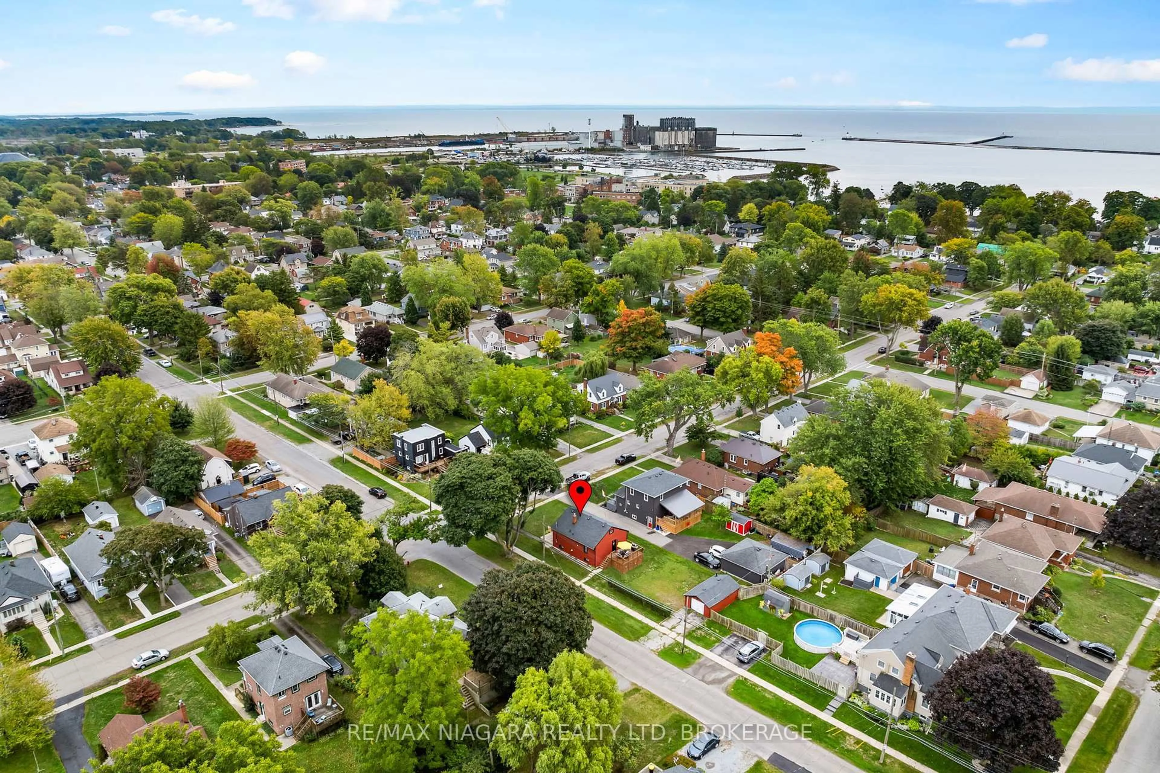 A pic from outside/outdoor area/front of a property/back of a property/a pic from drone, water/lake/river/ocean view for 94 Clare Ave, Port Colborne Ontario L3K 5H4