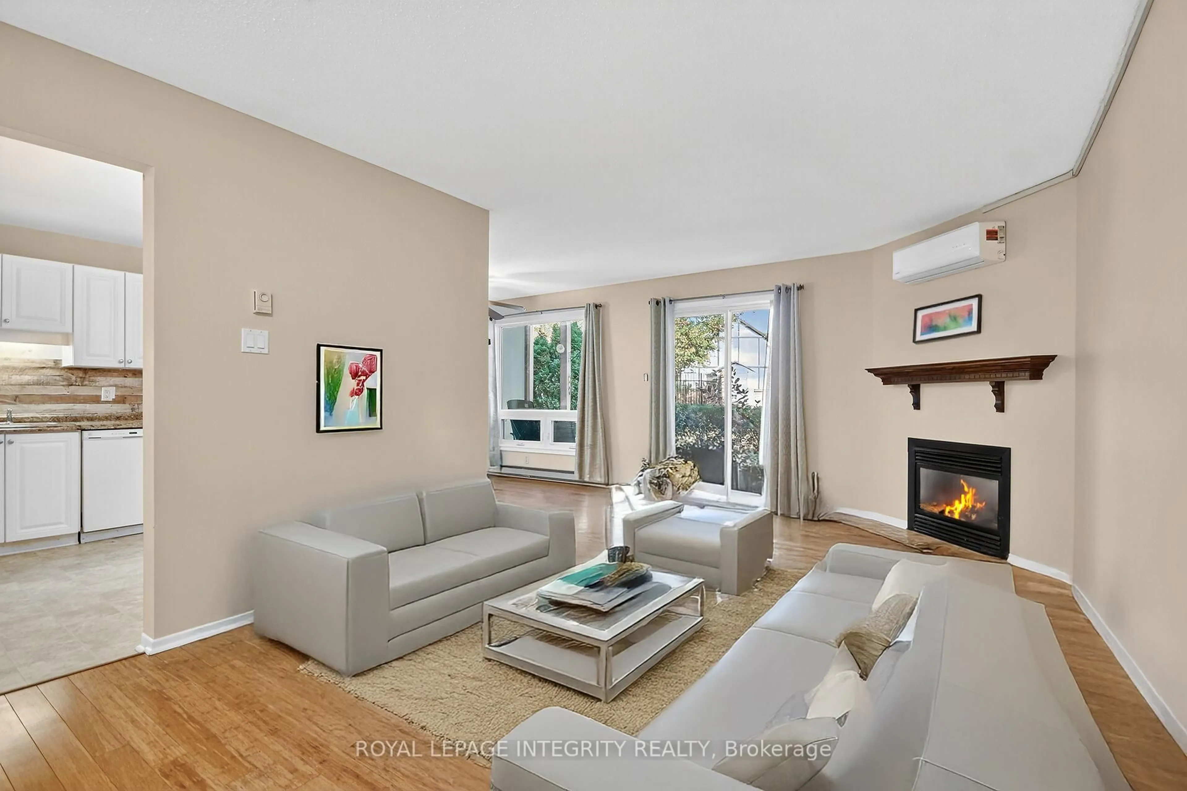 Living room with furniture, unknown for 214 Equestrian Dr #A, Ottawa Ontario K2M 1E2