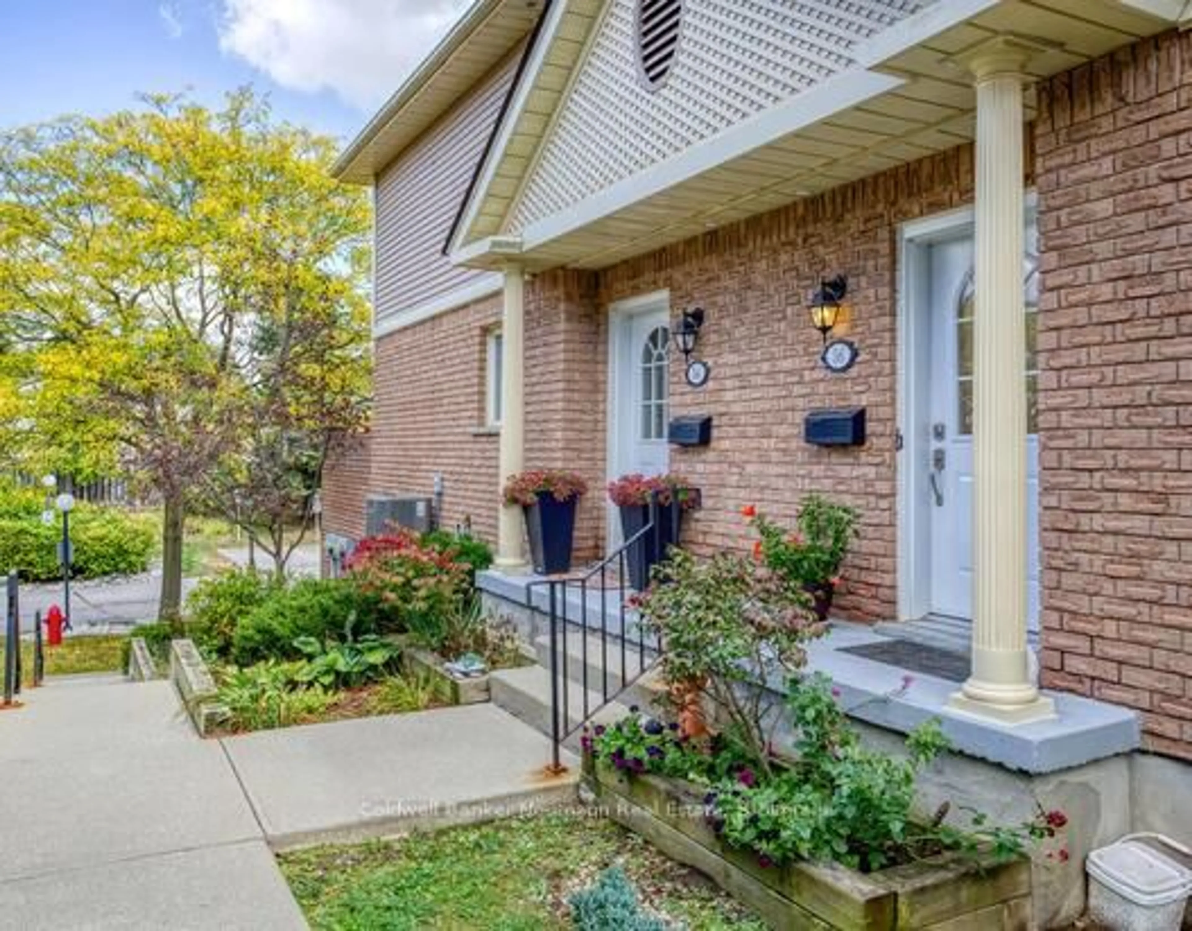 Home with brick exterior material, street for 941 Gordon St #56, Guelph Ontario N1G 4R9