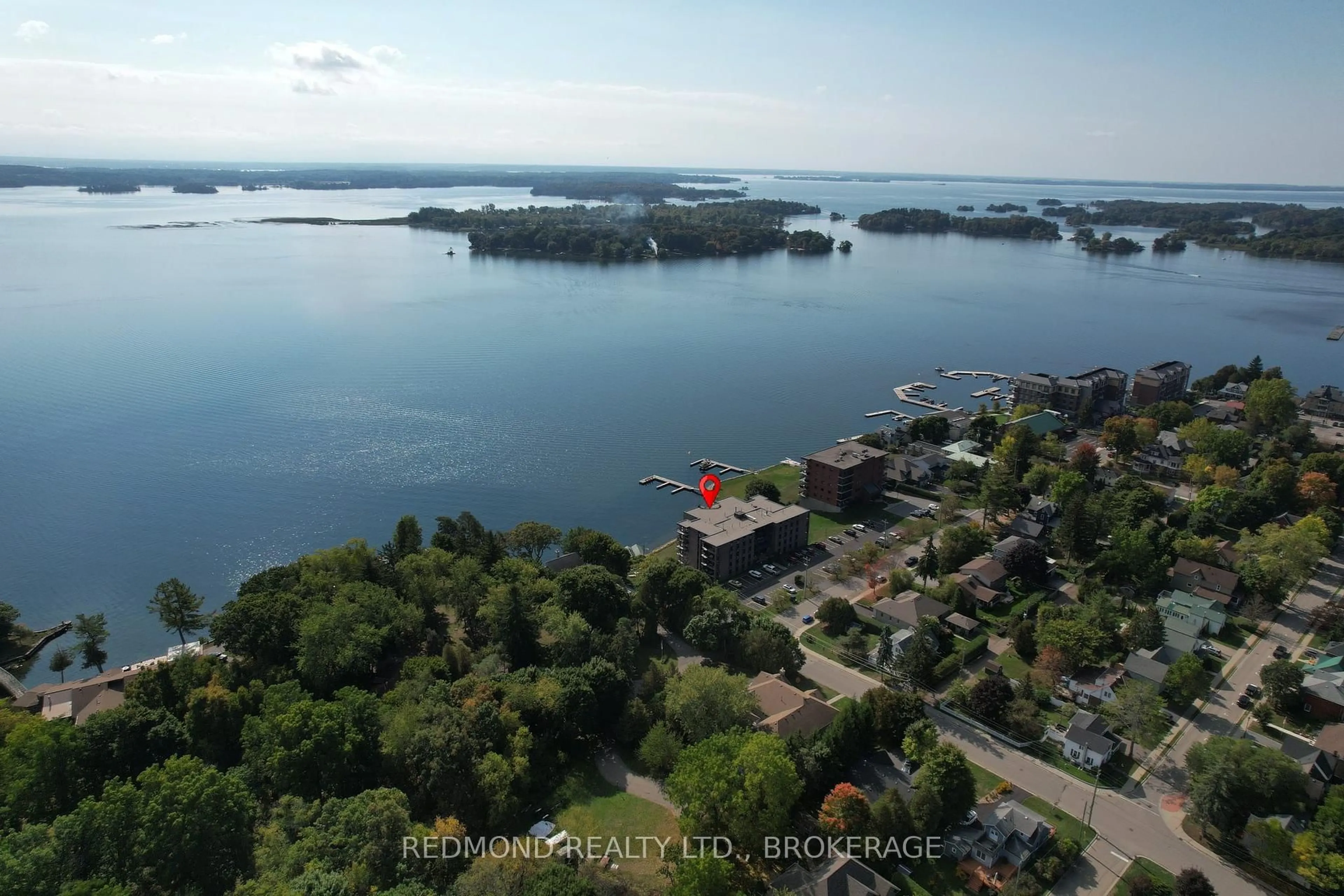 A pic from outside/outdoor area/front of a property/back of a property/a pic from drone, water/lake/river/ocean view for 610 William St #304, Gananoque Ontario K7G 3A4