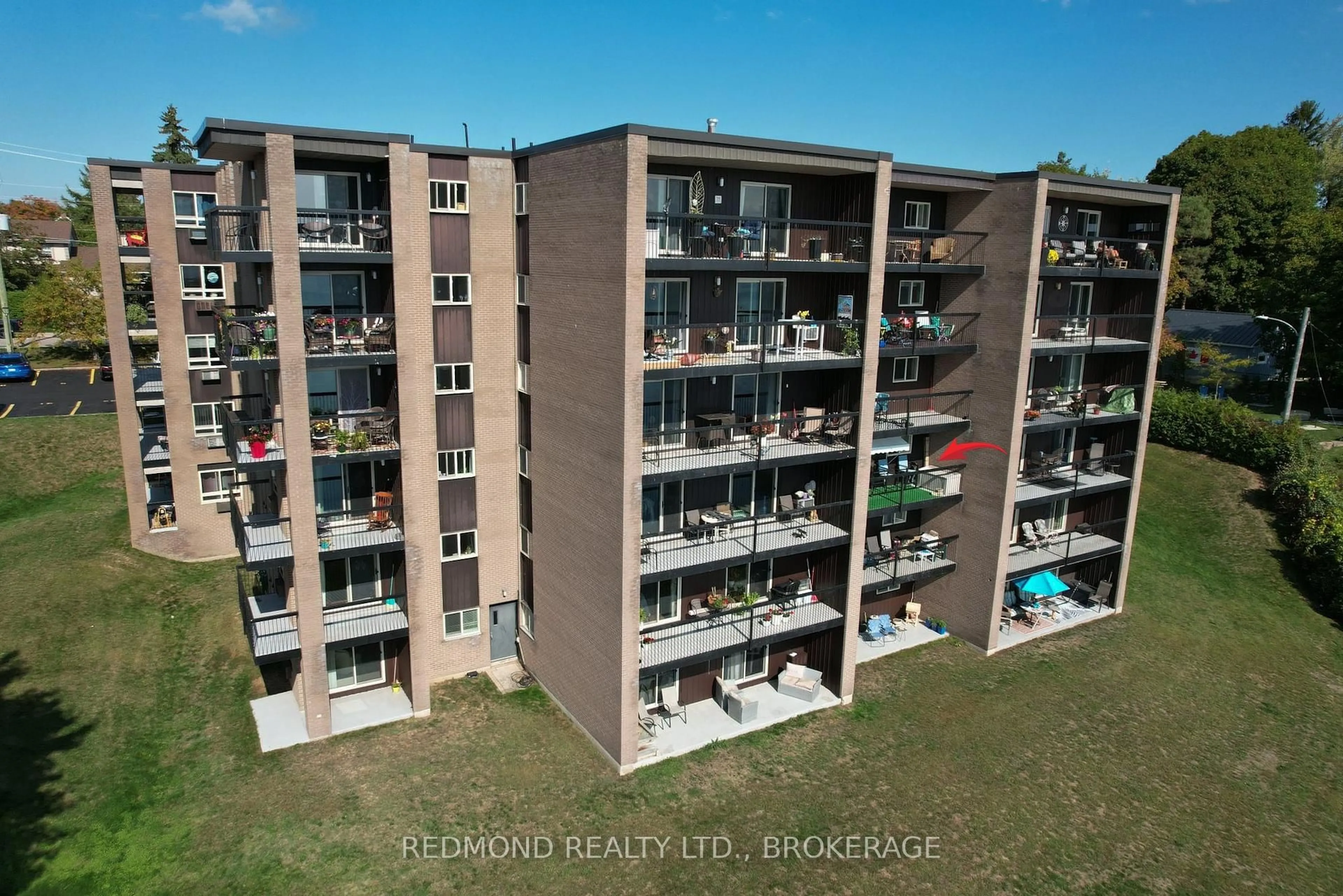 A pic from outside/outdoor area/front of a property/back of a property/a pic from drone, city buildings view from balcony for 610 William St #304, Gananoque Ontario K7G 3A4