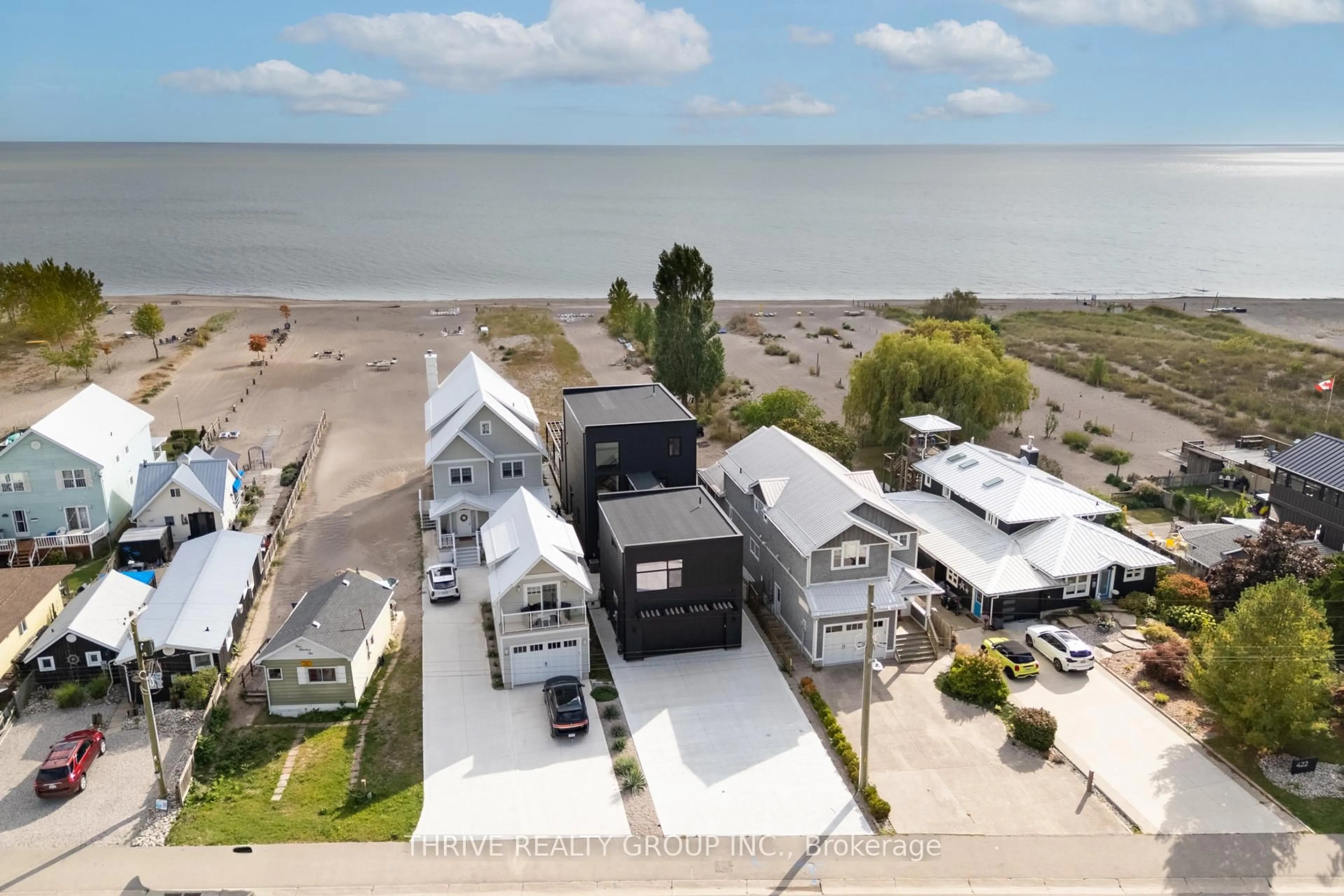 A pic from outside/outdoor area/front of a property/back of a property/a pic from drone, water/lake/river/ocean view for 416 Edith Cavell Blvd, Central Elgin Ontario N5L 1E7