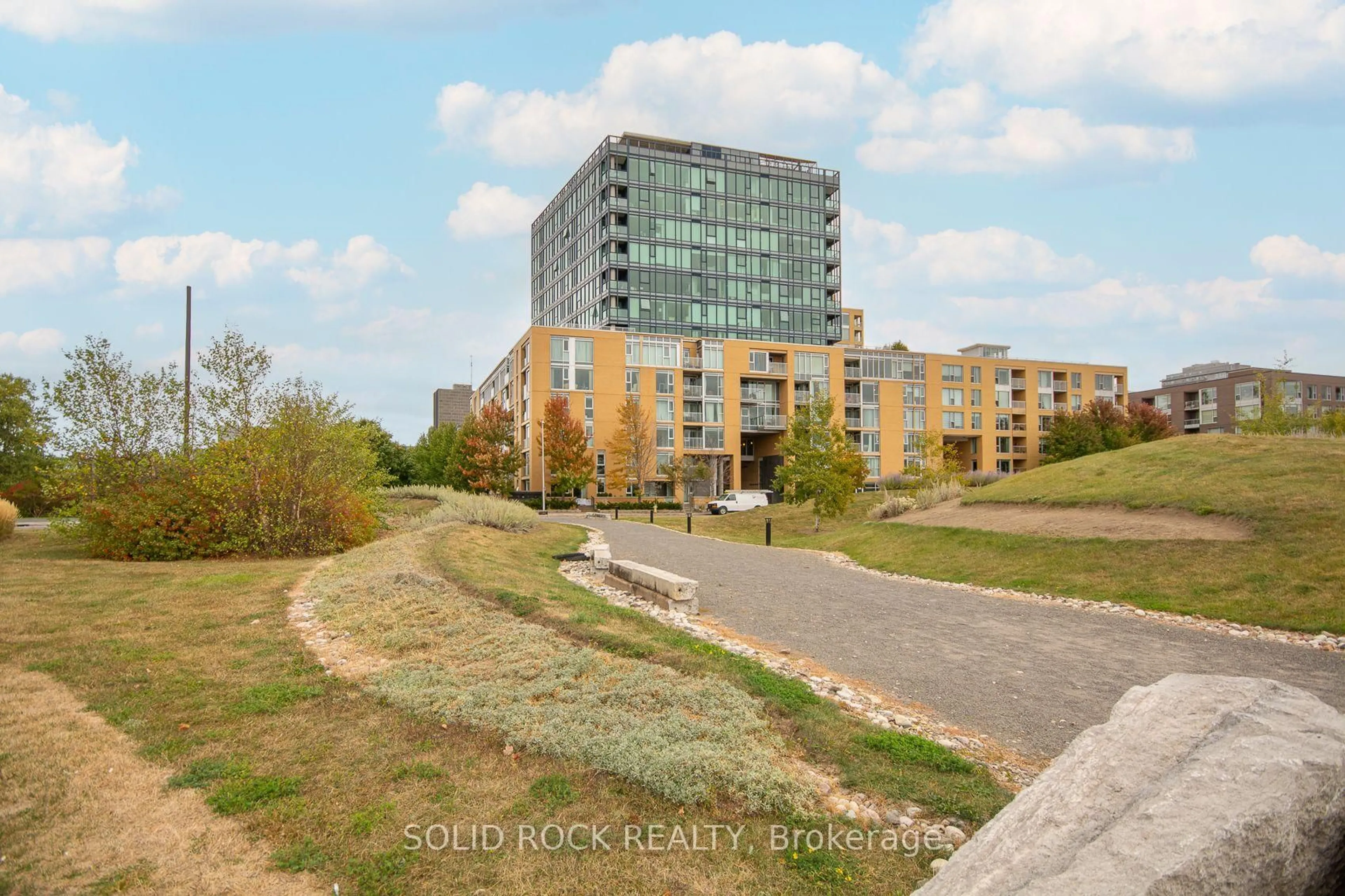A pic from outside/outdoor area/front of a property/back of a property/a pic from drone, unknown for 200 Lett St #210, Ottawa Ontario K1R 0A7