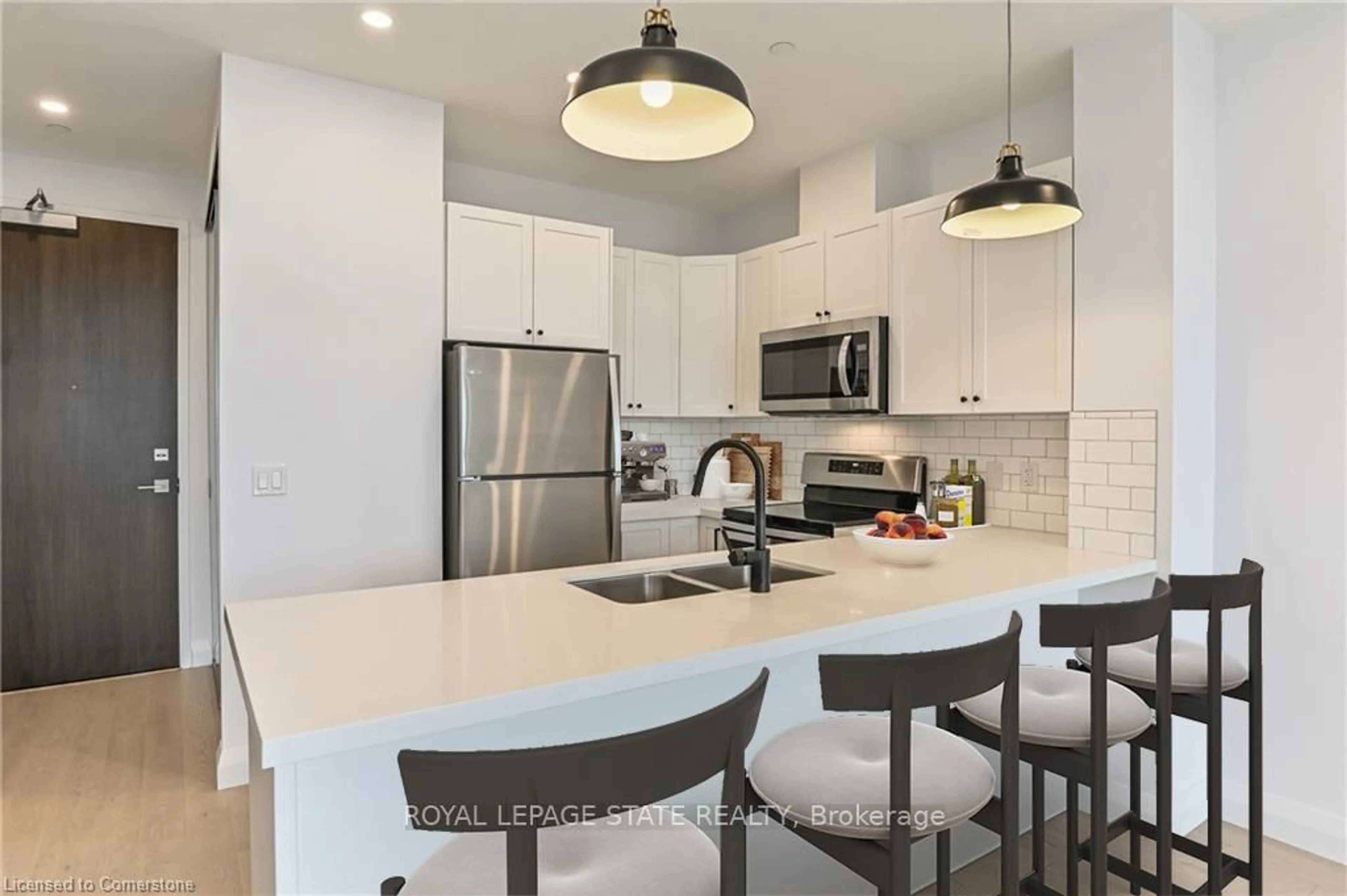 Open concept kitchen, ceramic/tile floor for 101 Locke St #507, Hamilton Ontario L8P 4A6