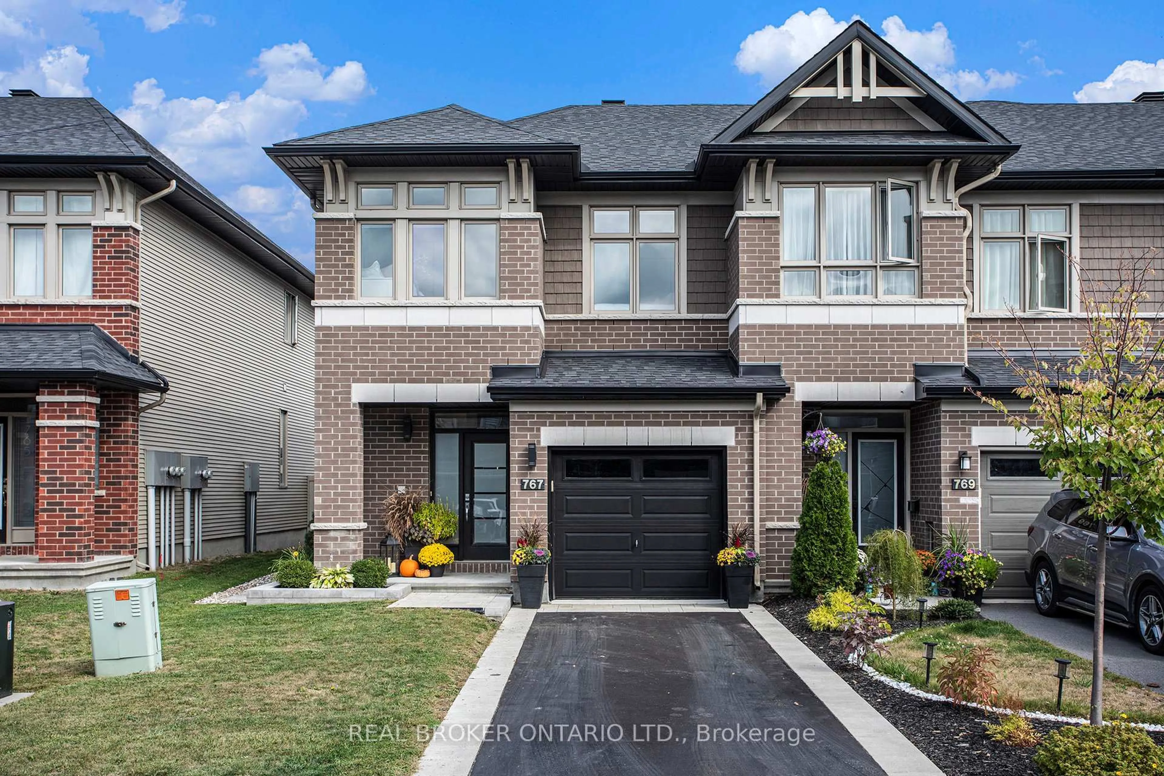 Home with brick exterior material, street for 767 Cairn Cres, Ottawa Ontario K1W 0P4