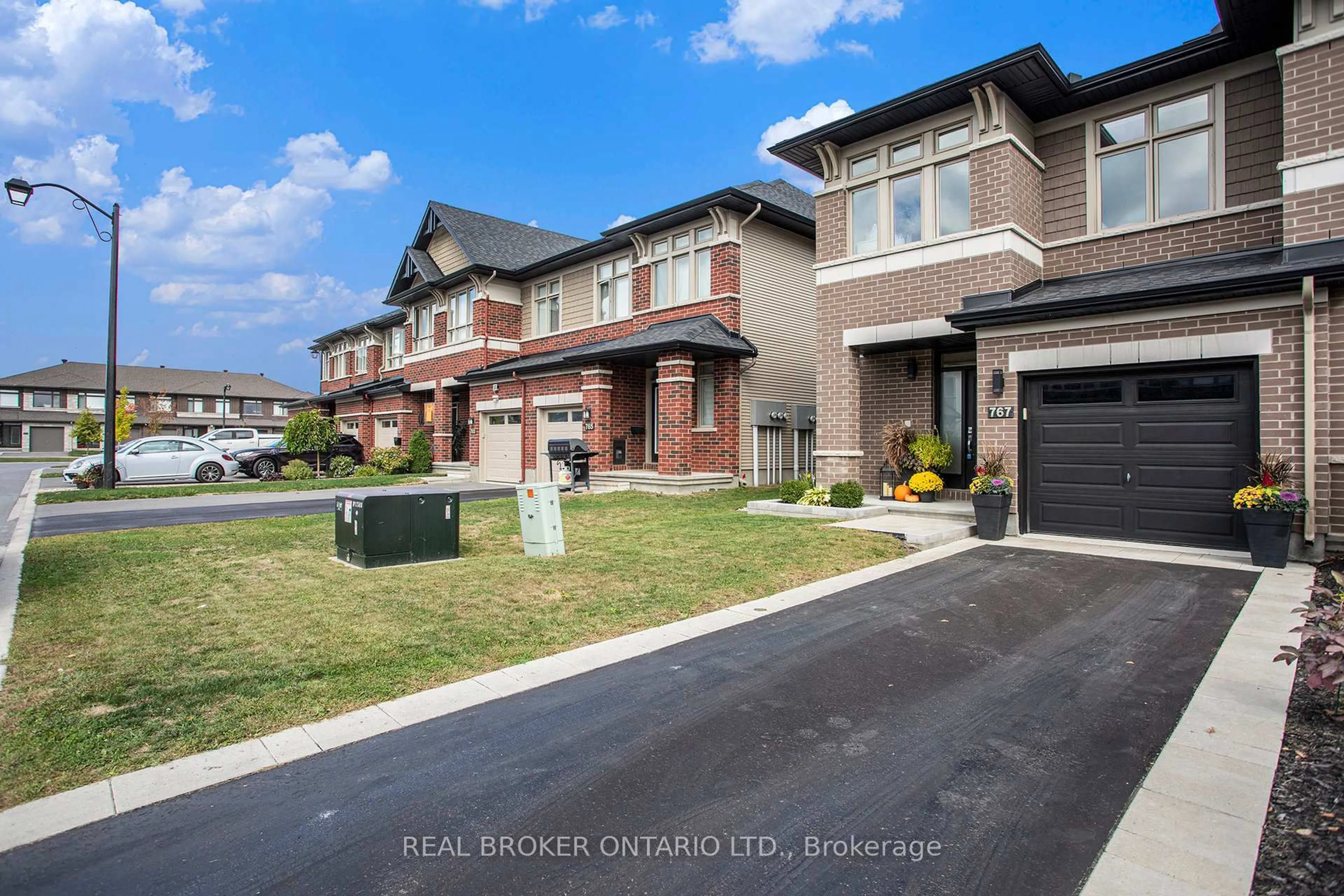 Home with brick exterior material, street for 767 Cairn Cres, Ottawa Ontario K1W 0P4
