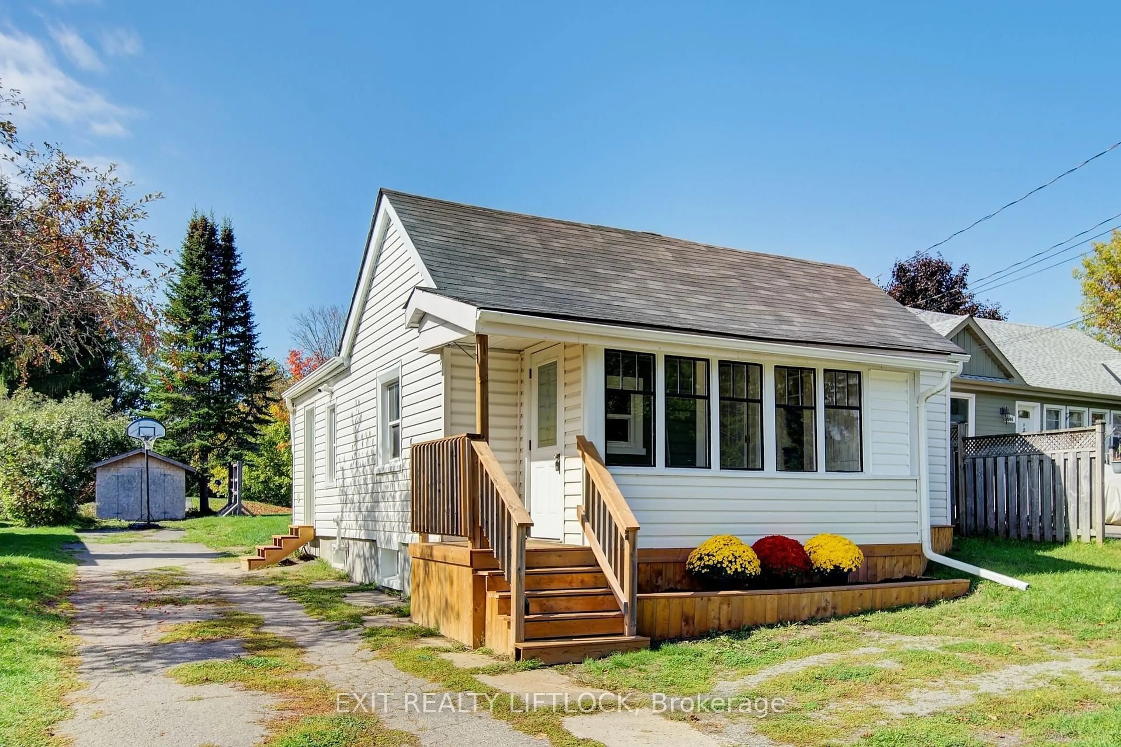 Home with vinyl exterior material, street for 2004 Bensfort Rd, Peterborough Ontario K9J 0G7