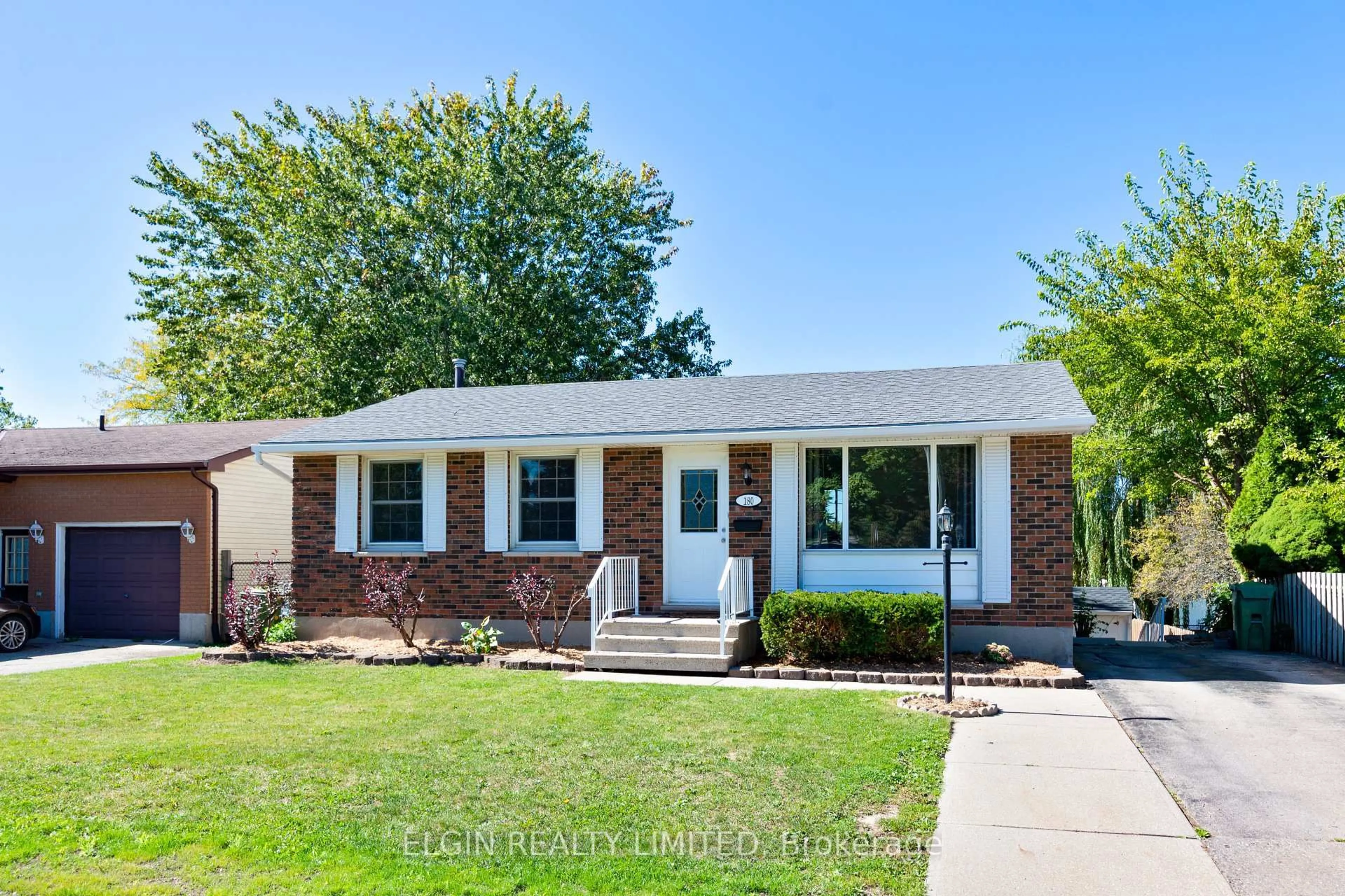 Home with brick exterior material, street for 180 Fairview Ave, St. Thomas Ontario N5R 4Y1