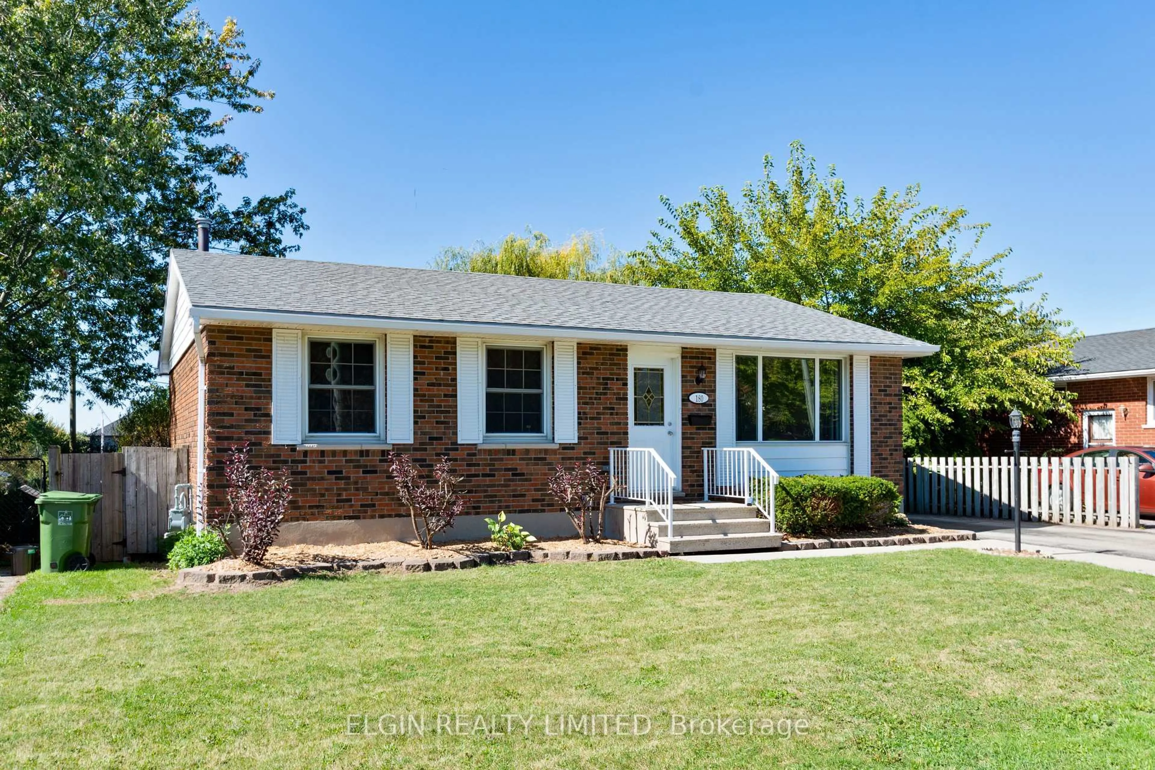 Home with brick exterior material, street for 180 Fairview Ave, St. Thomas Ontario N5R 4Y1