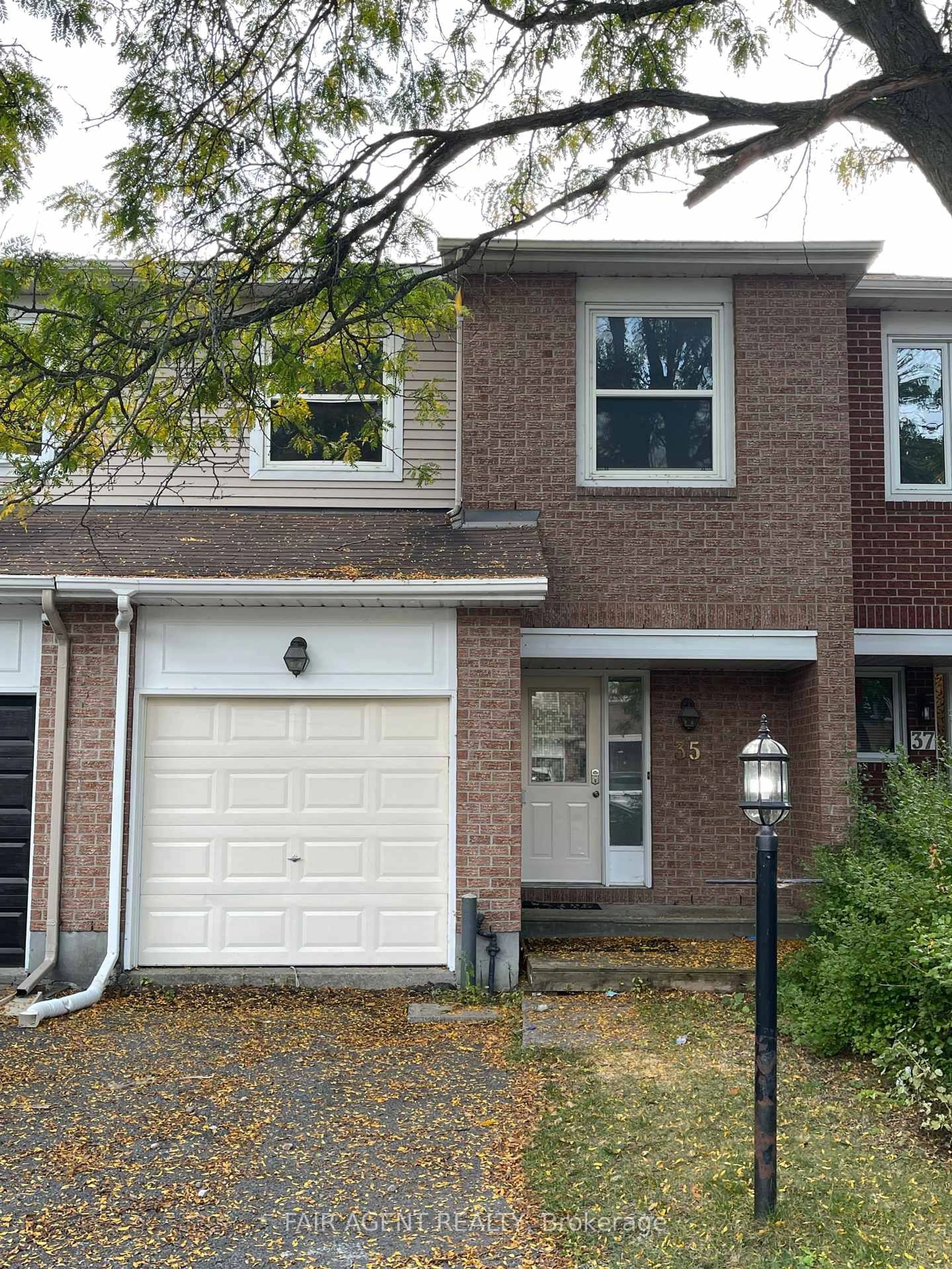 Home with brick exterior material, street for 35 WILLWOOD Cres, Ottawa Ontario K2J 4B2