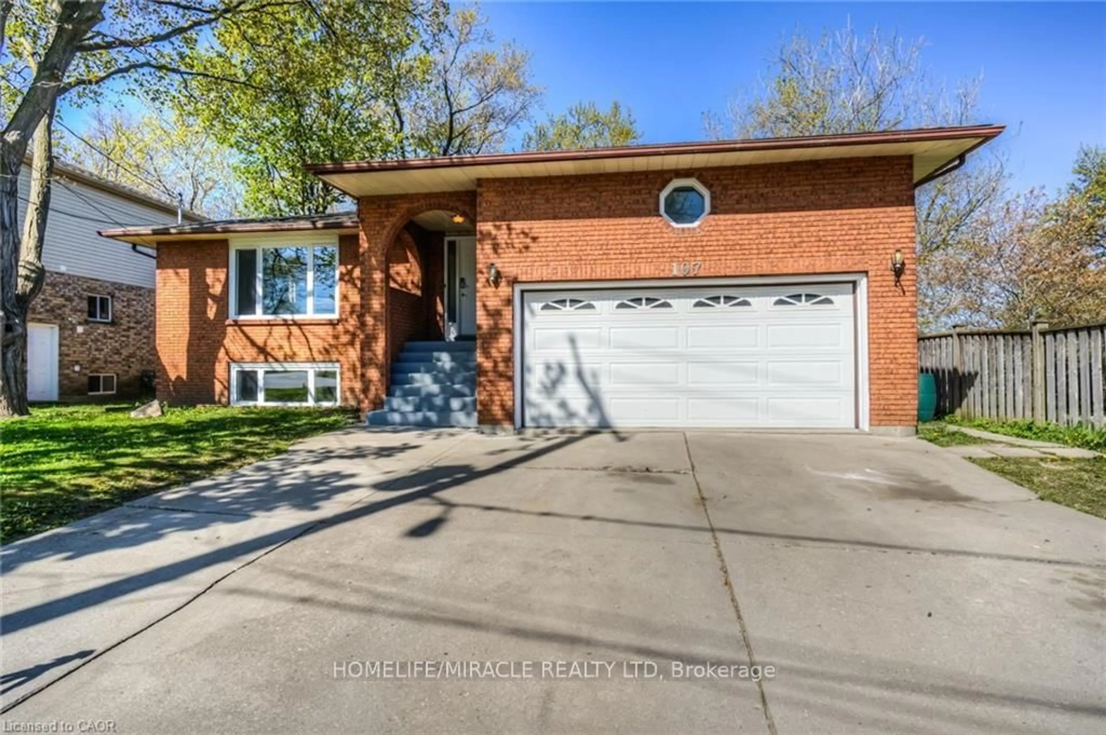 Home with brick exterior material, street for 107 Pinnacle Dr, Kitchener Ontario N2P 1B8