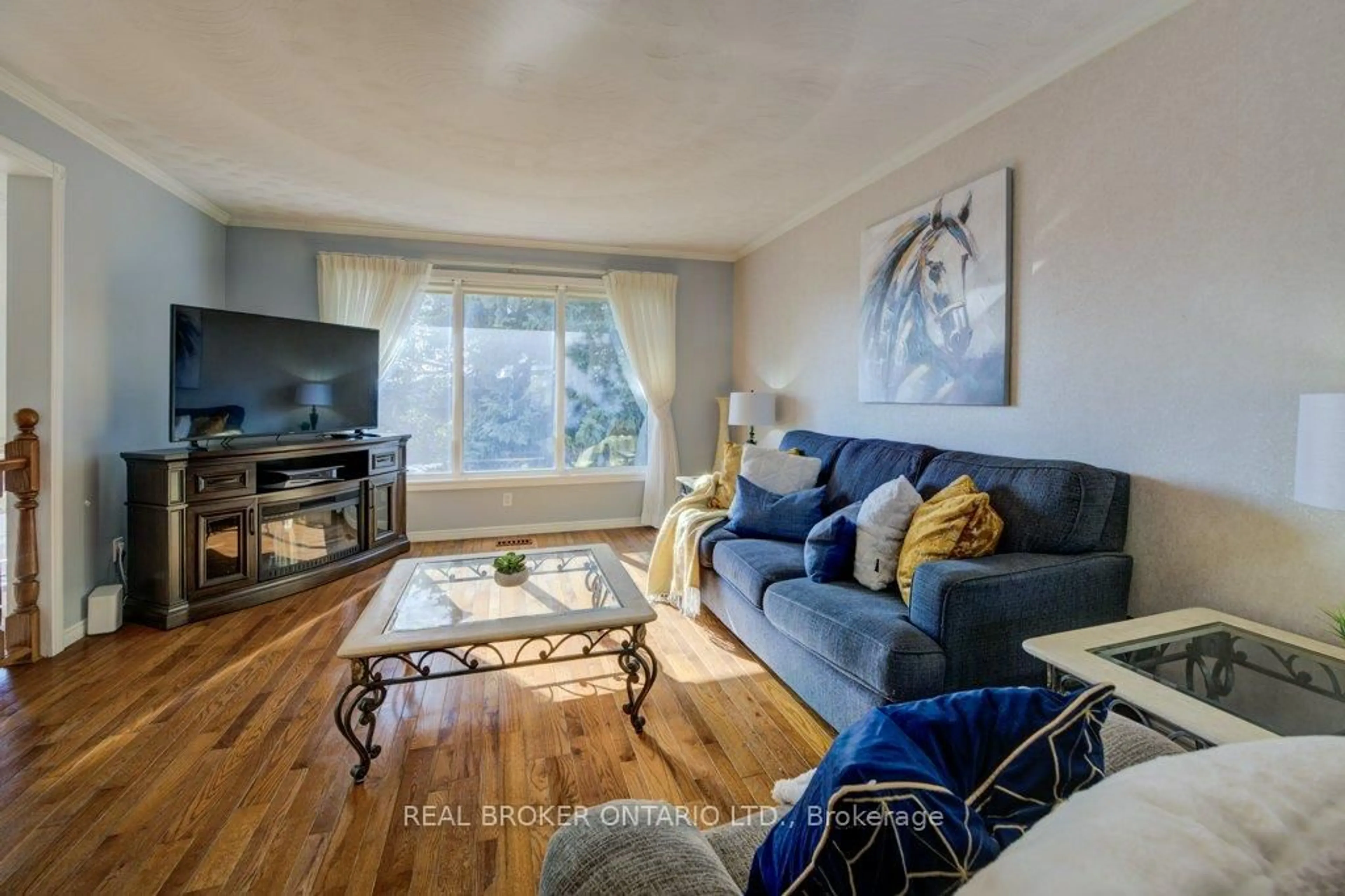 Living room with furniture, wood/laminate floor for 144 Laurentian Dr, Kitchener Ontario N2E 2M3