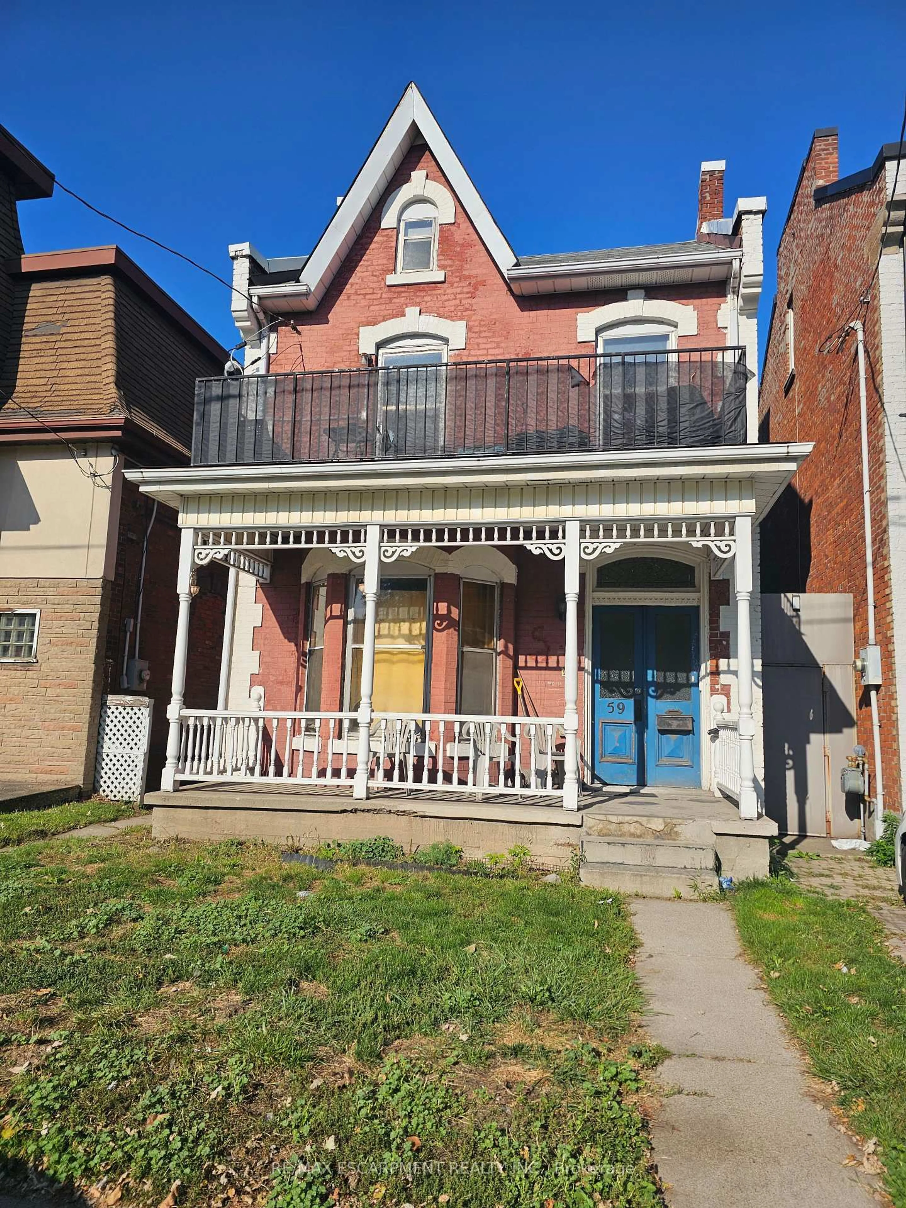 Home with brick exterior material, street for 59 VICTORIA Ave, Hamilton Ontario L8L 5E3