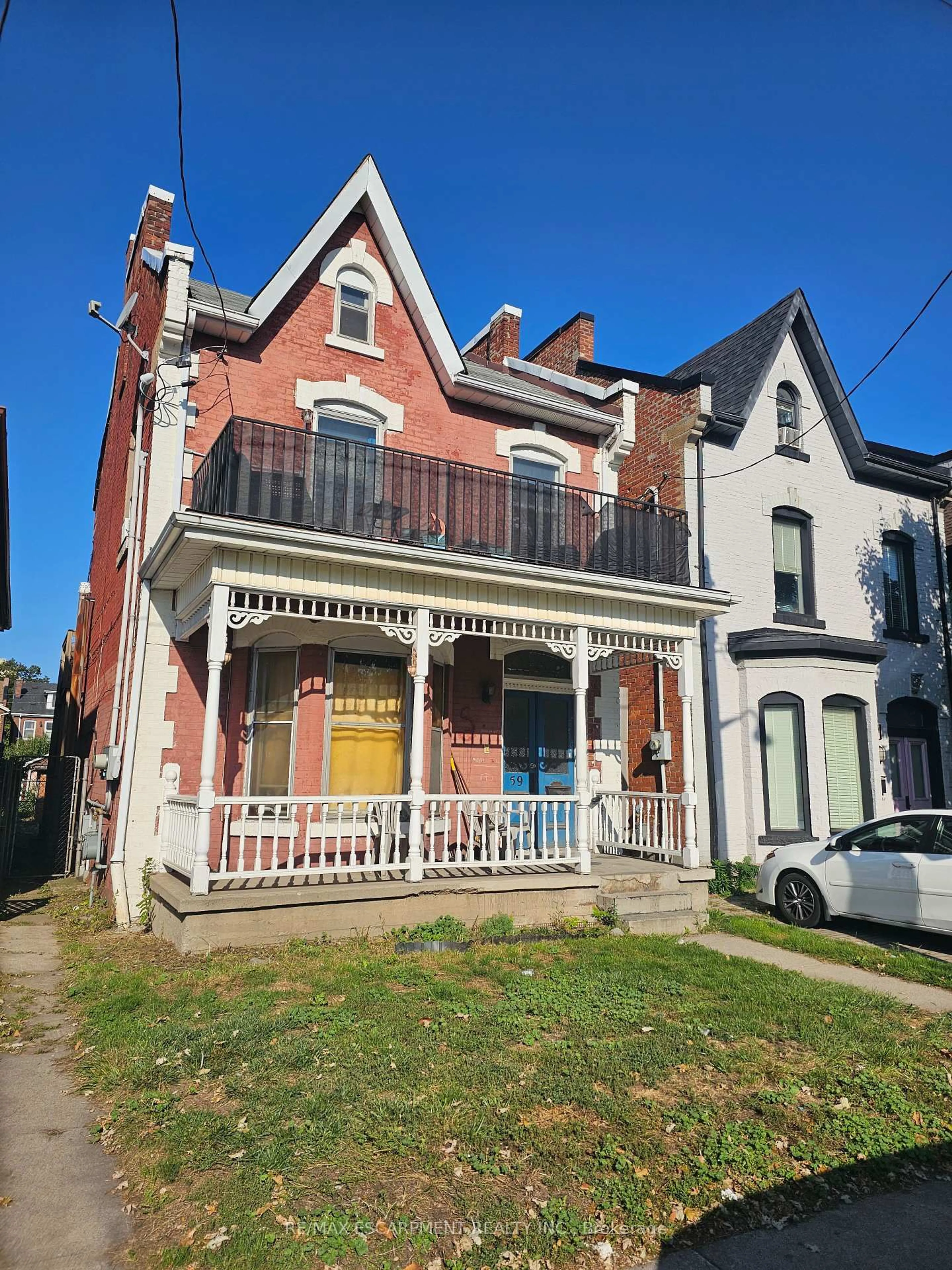 Home with brick exterior material, street for 59 VICTORIA Ave, Hamilton Ontario L8L 5E3