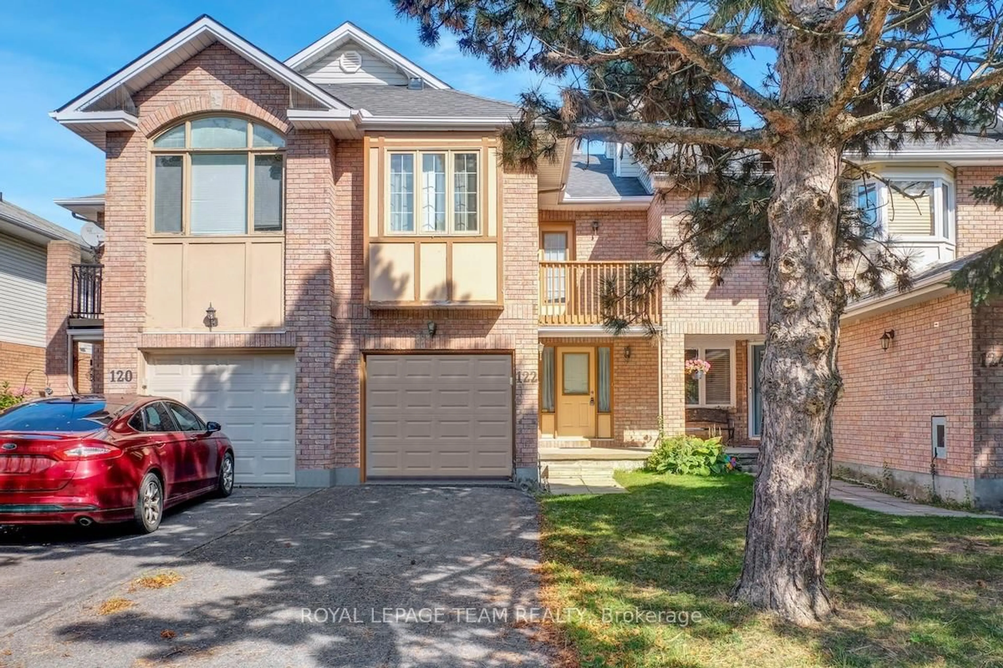 Home with brick exterior material, street for 122 Thornbury Cres, Ottawa Ontario K2G 6C2