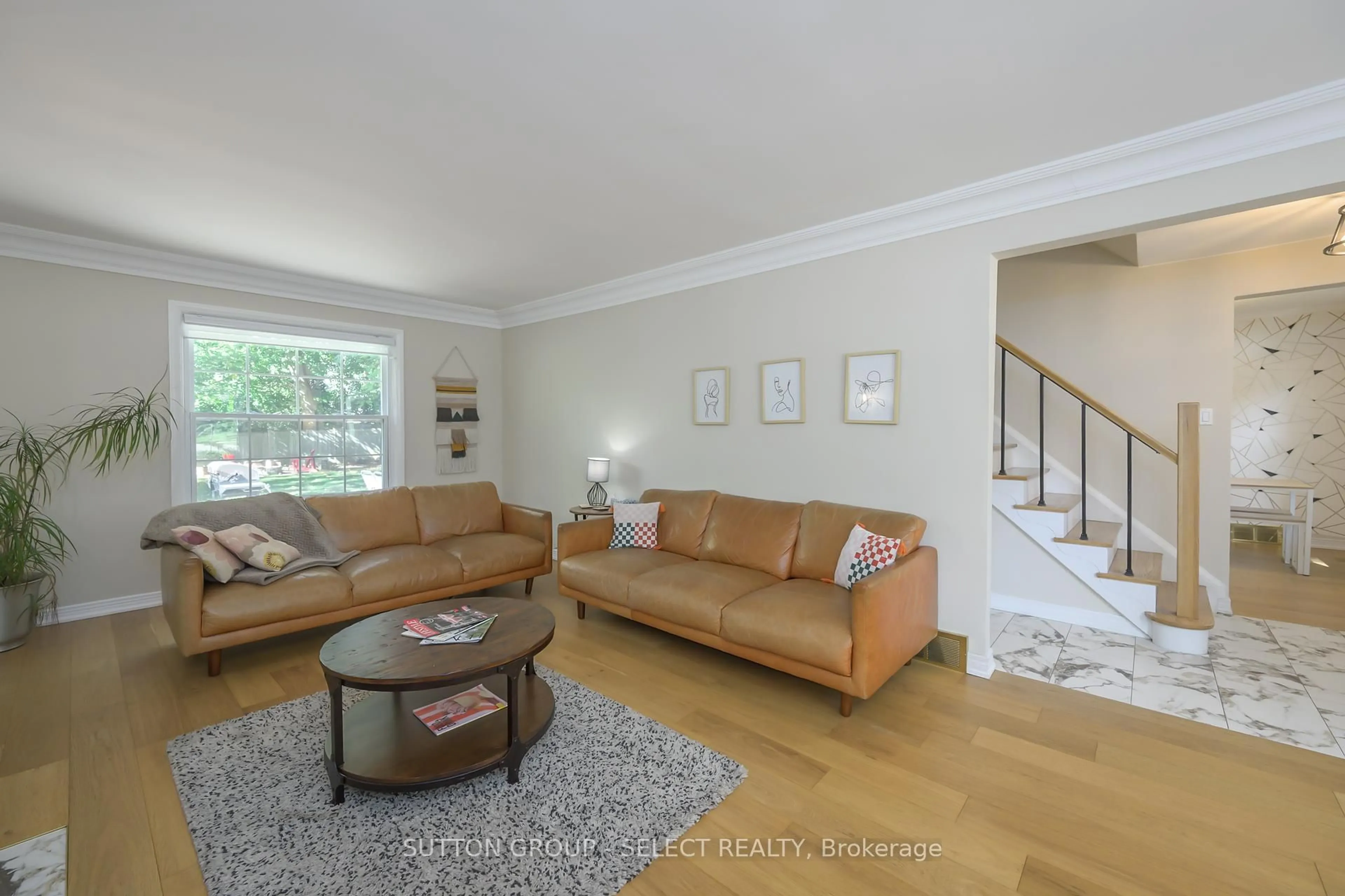 Living room with furniture, wood/laminate floor for 469 Riverside Dr, London North Ontario N6H 2R9