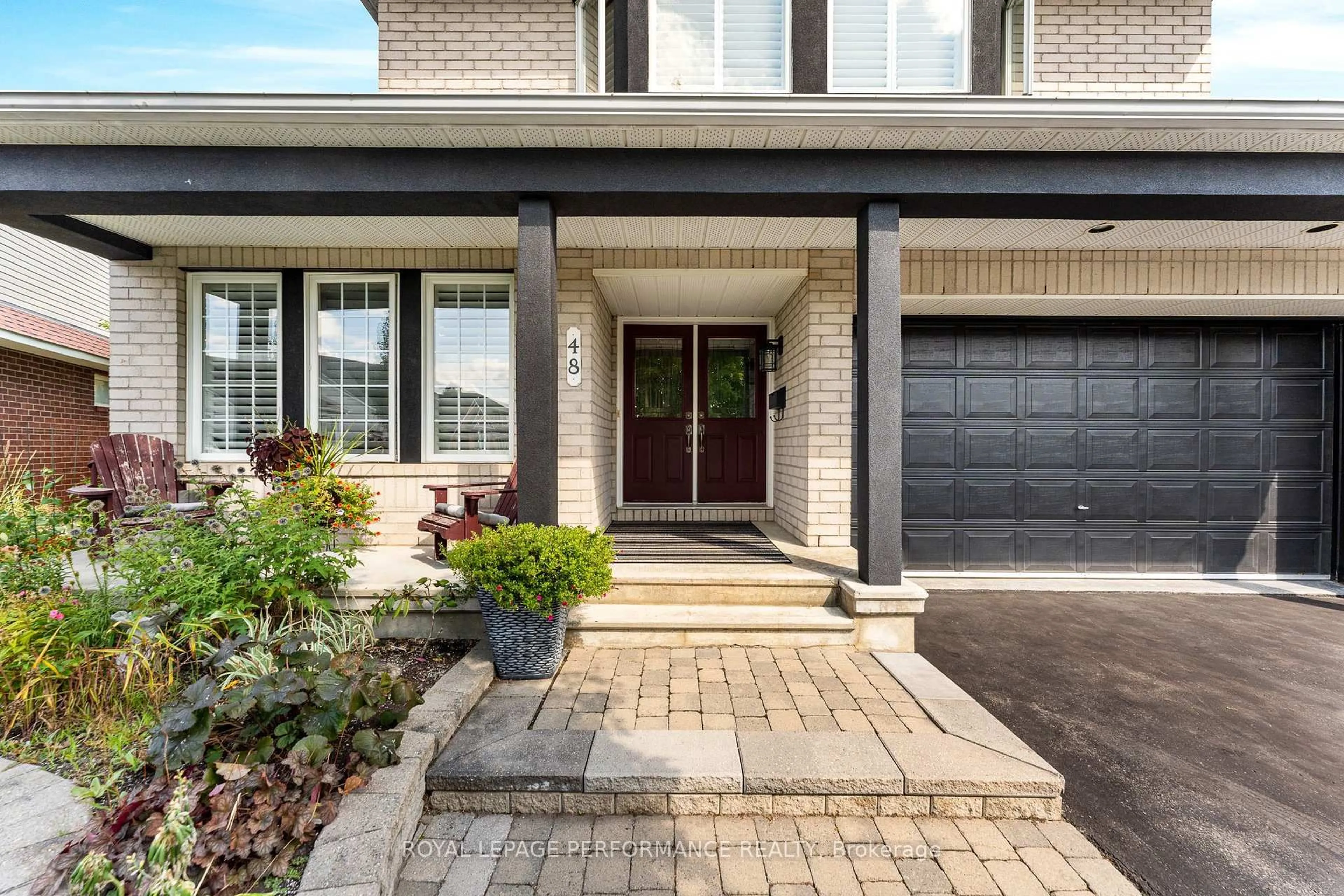 Home with brick exterior material, street for 48 Settler's Ridge Way, Ottawa Ontario K2J 4V2