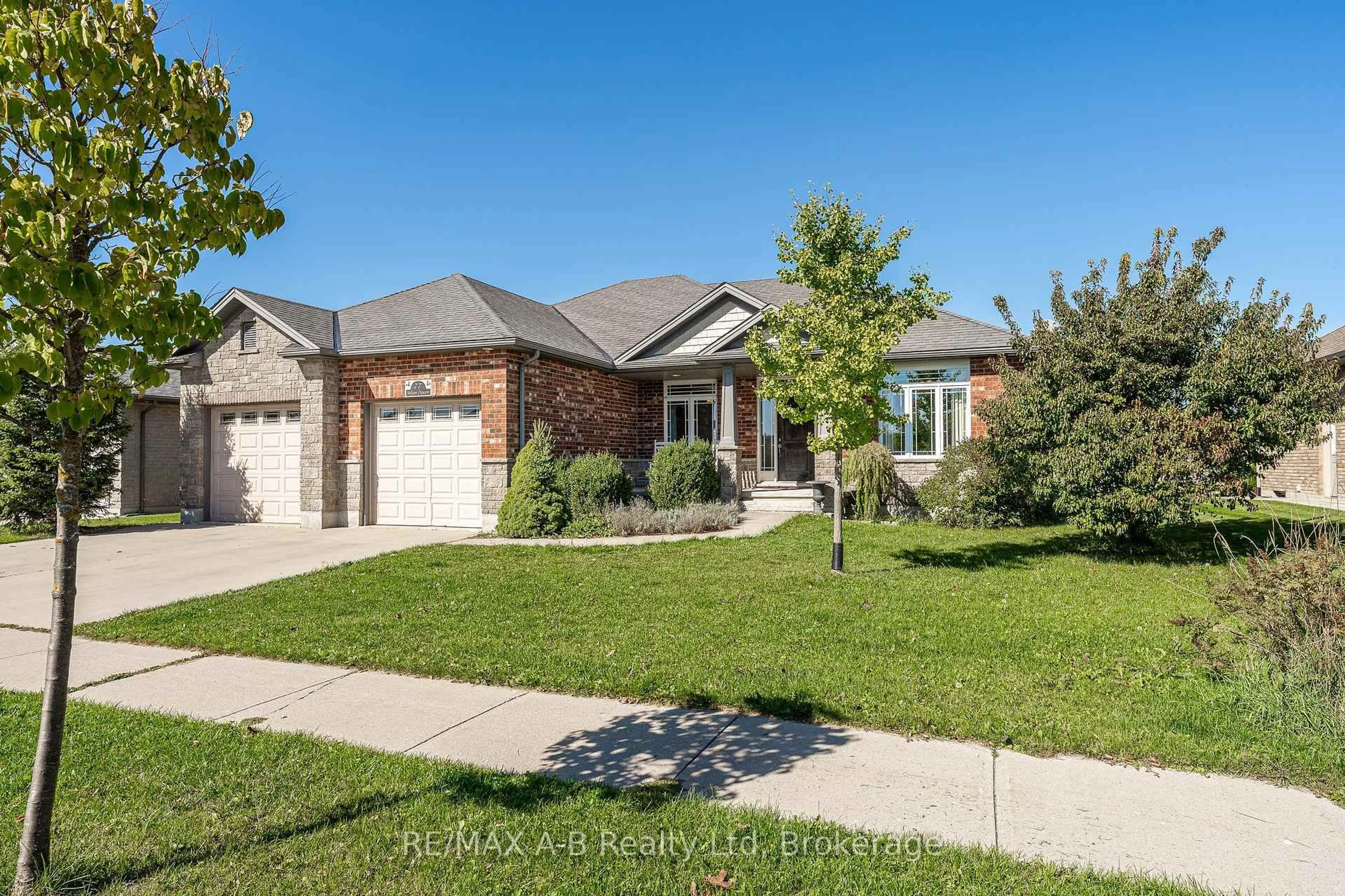 Home with brick exterior material, street for 77 Millson Cres, St. Marys Ontario N4X 1A0