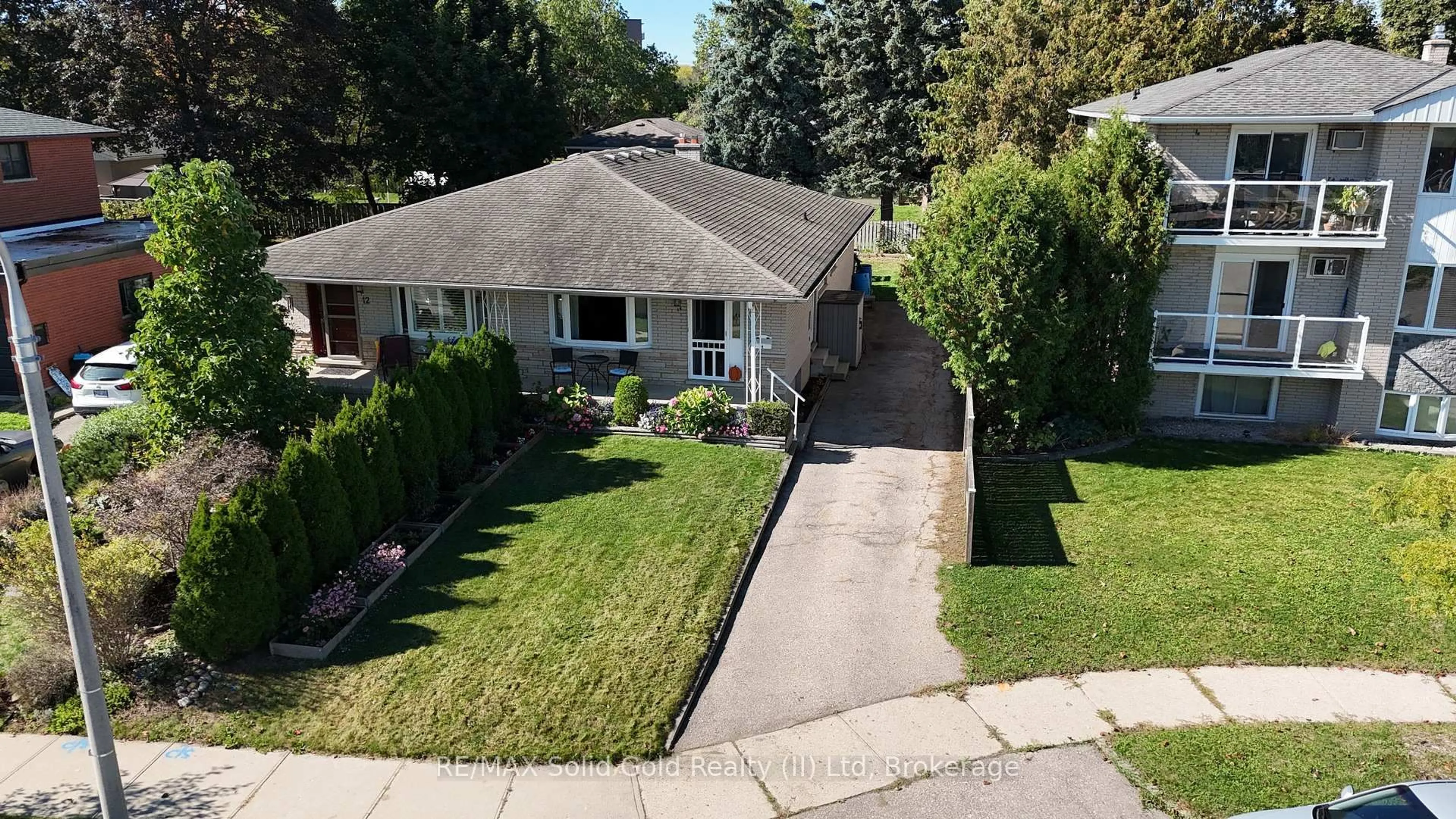 A pic from outside/outdoor area/front of a property/back of a property/a pic from drone, street for 14 Carnaby Cres, Kitchener Ontario N2A 1M7