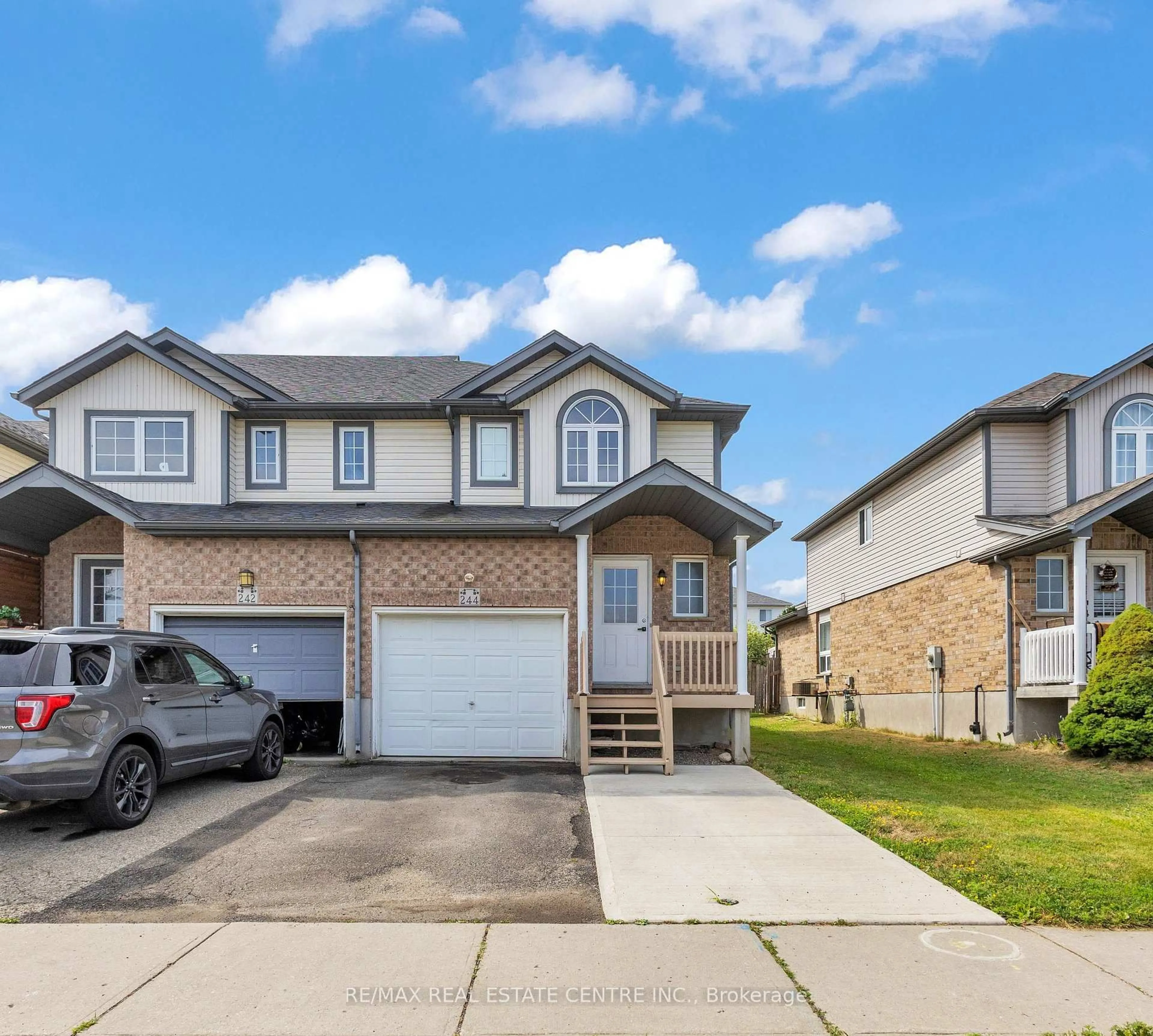 Home with vinyl exterior material, street for 244 Activa Ave, Kitchener Ontario N2E 3T9
