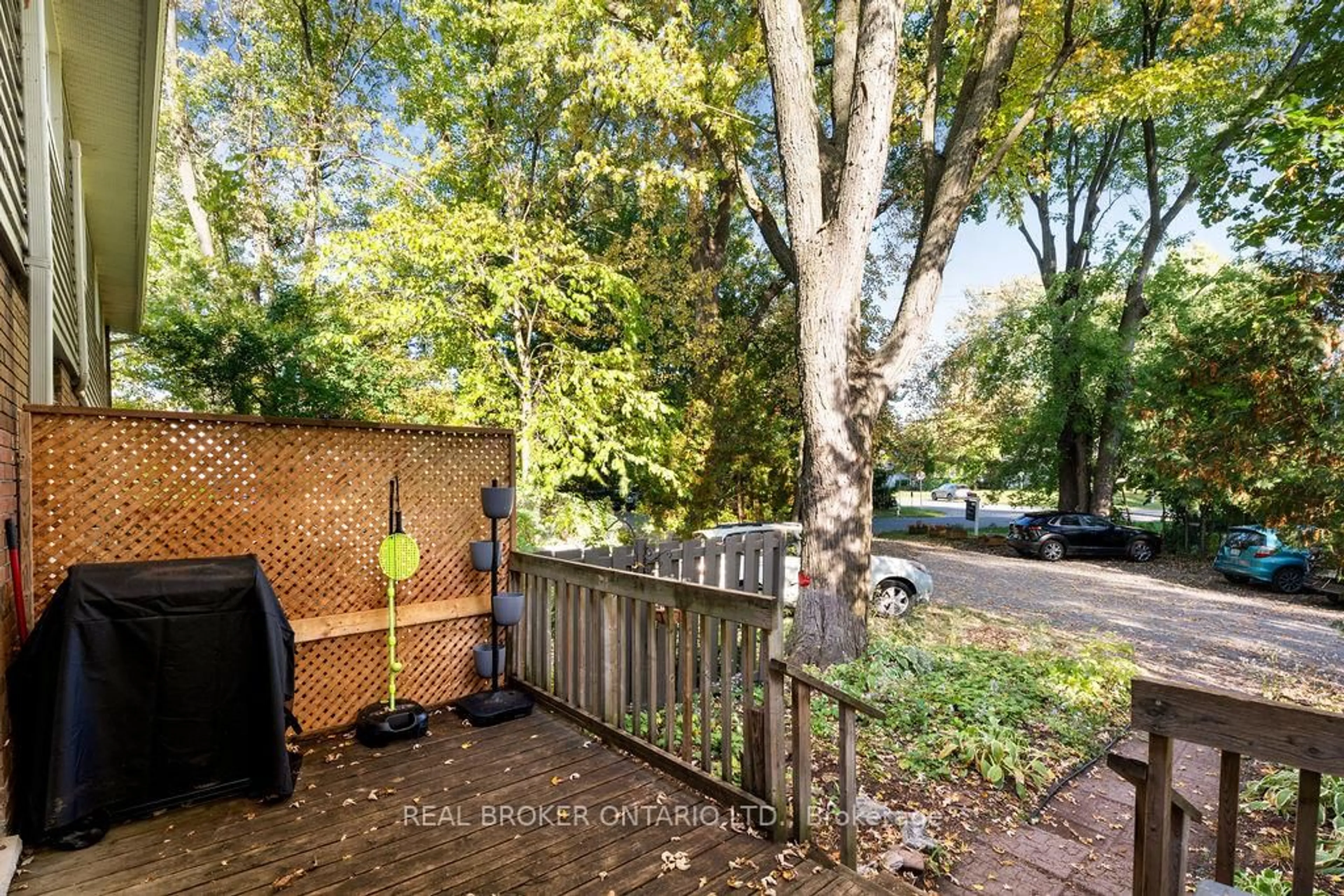 A pic from outside/outdoor area/front of a property/back of a property/a pic from drone, forest/trees view for 20 Kempster Ave #3, Ottawa Ontario K2B 8B2