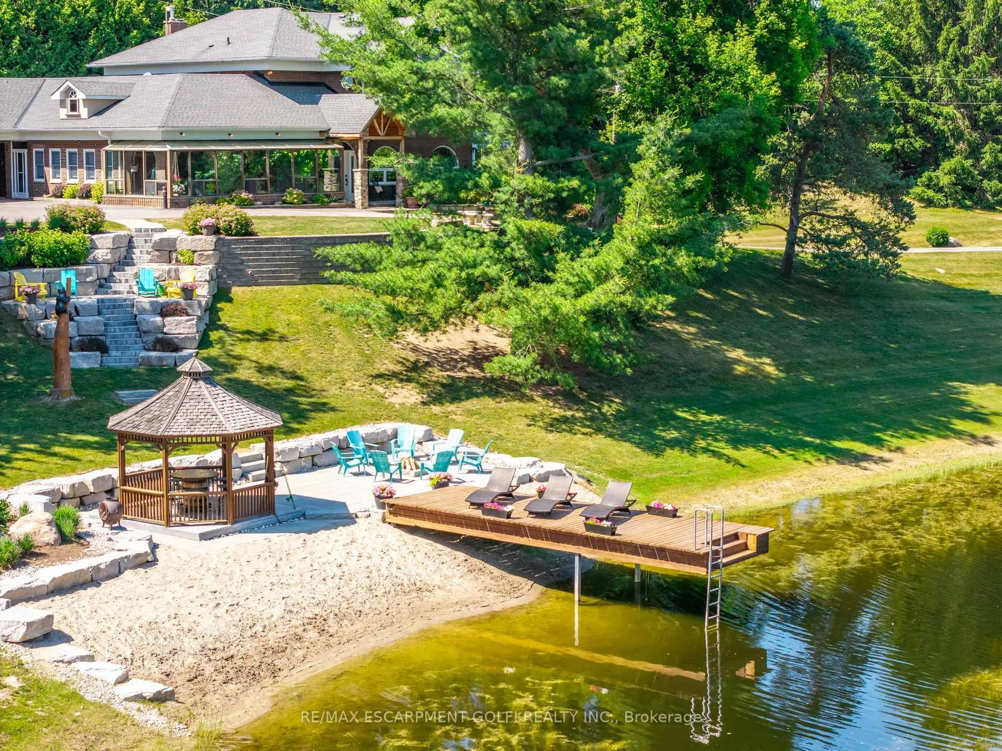 A pic from outside/outdoor area/front of a property/back of a property/a pic from drone, water/lake/river/ocean view for 994030 Mono Adjala Town Line, Mono Ontario L9W 6H8