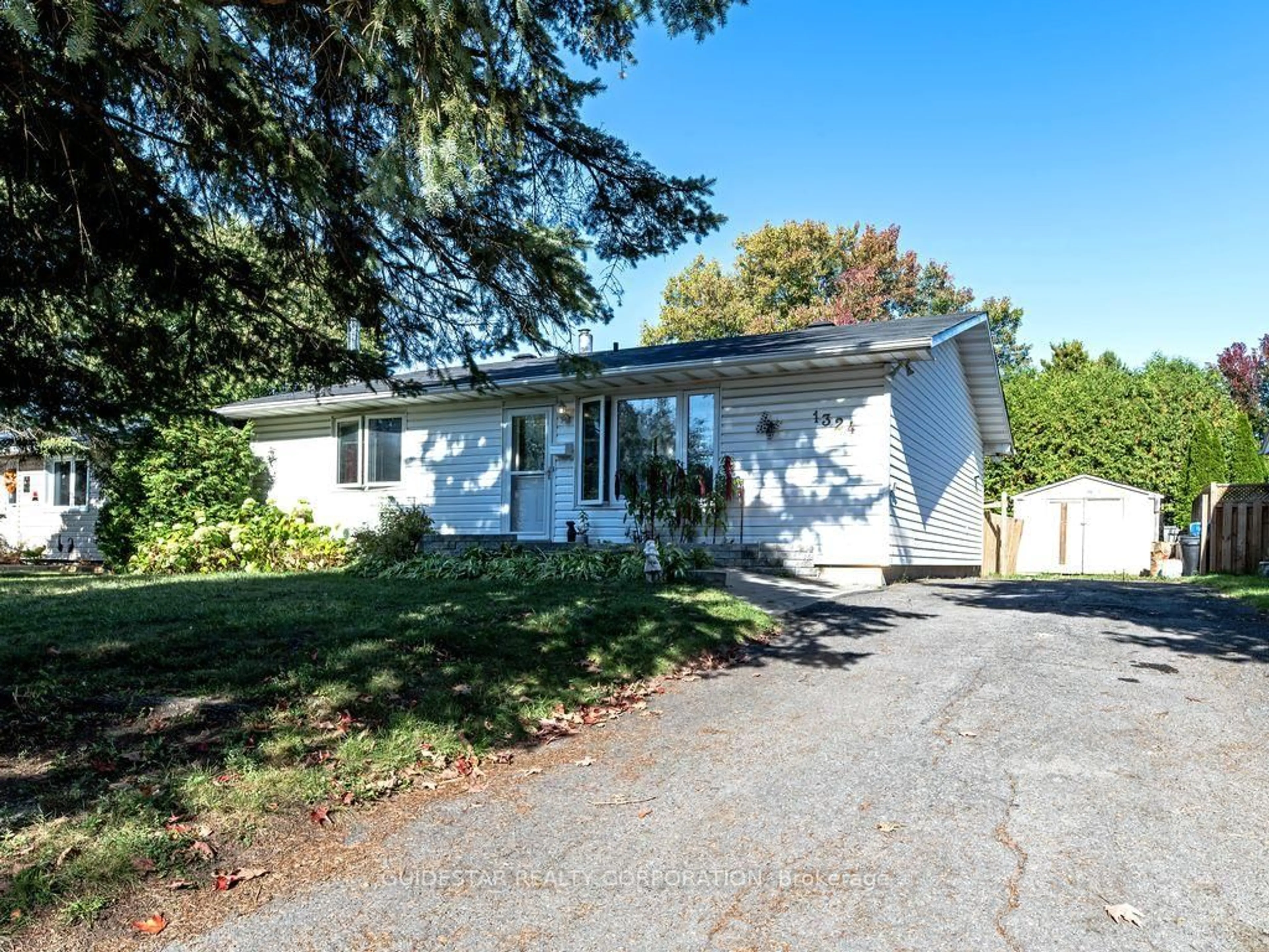 Home with vinyl exterior material, street for 1324 Rainbow Cres, Ottawa Ontario K1J 8E2