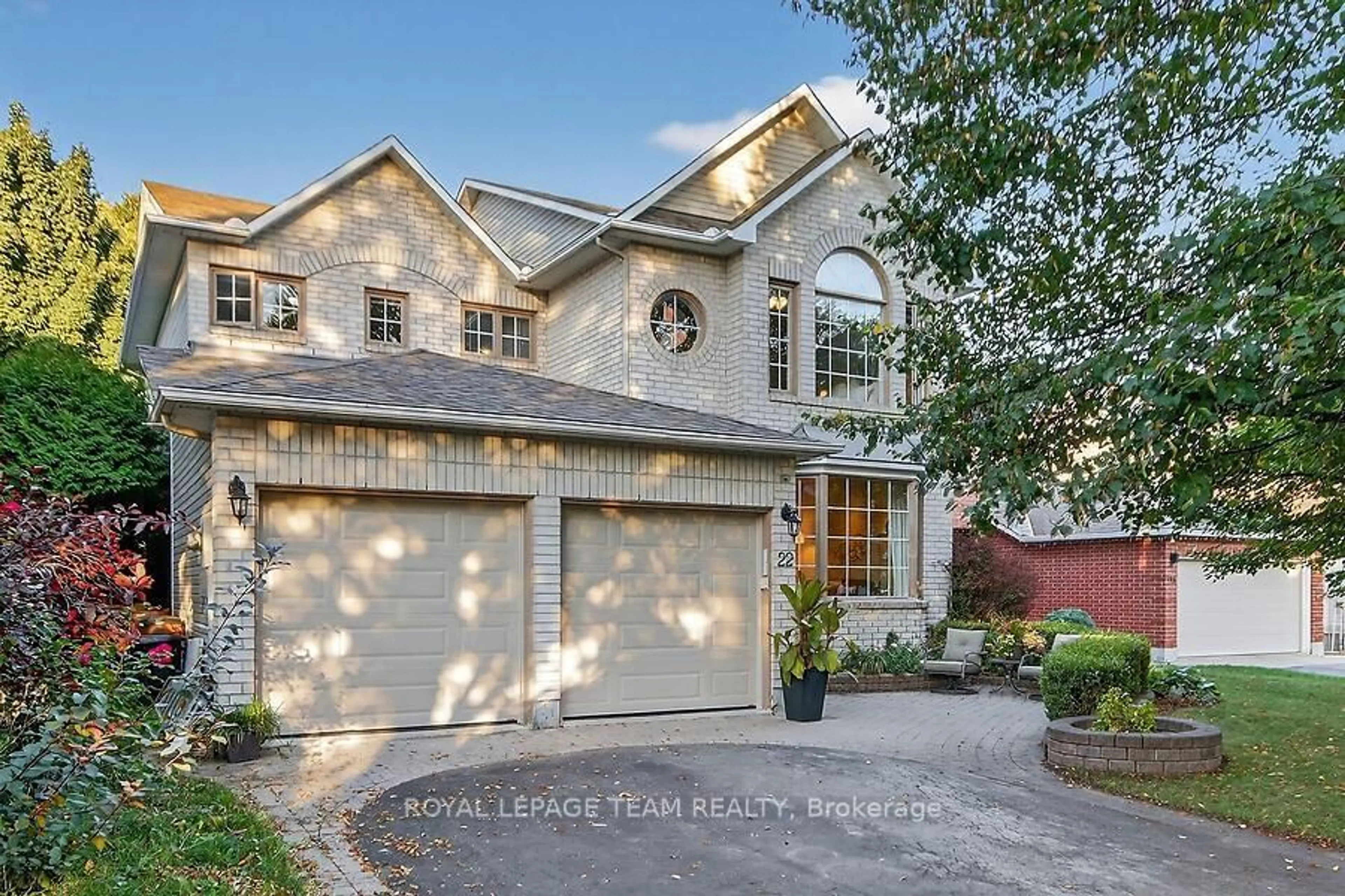 Home with brick exterior material, street for 22 Birchfield Ave, Kanata Ontario K2M 2N5
