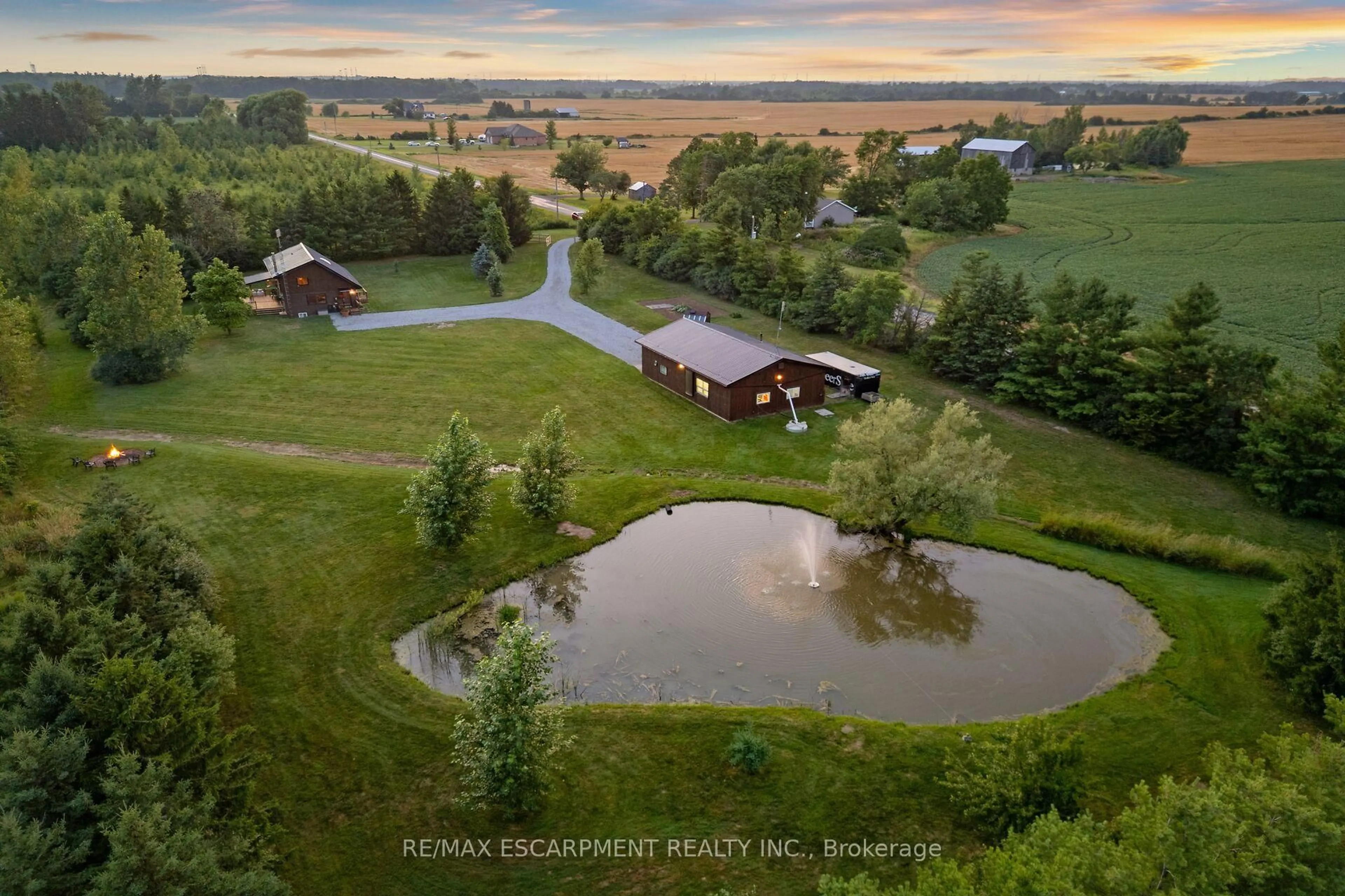 A pic from outside/outdoor area/front of a property/back of a property/a pic from drone, water/lake/river/ocean view for 526 2nd Line, Haldimand Ontario N0A 1H0