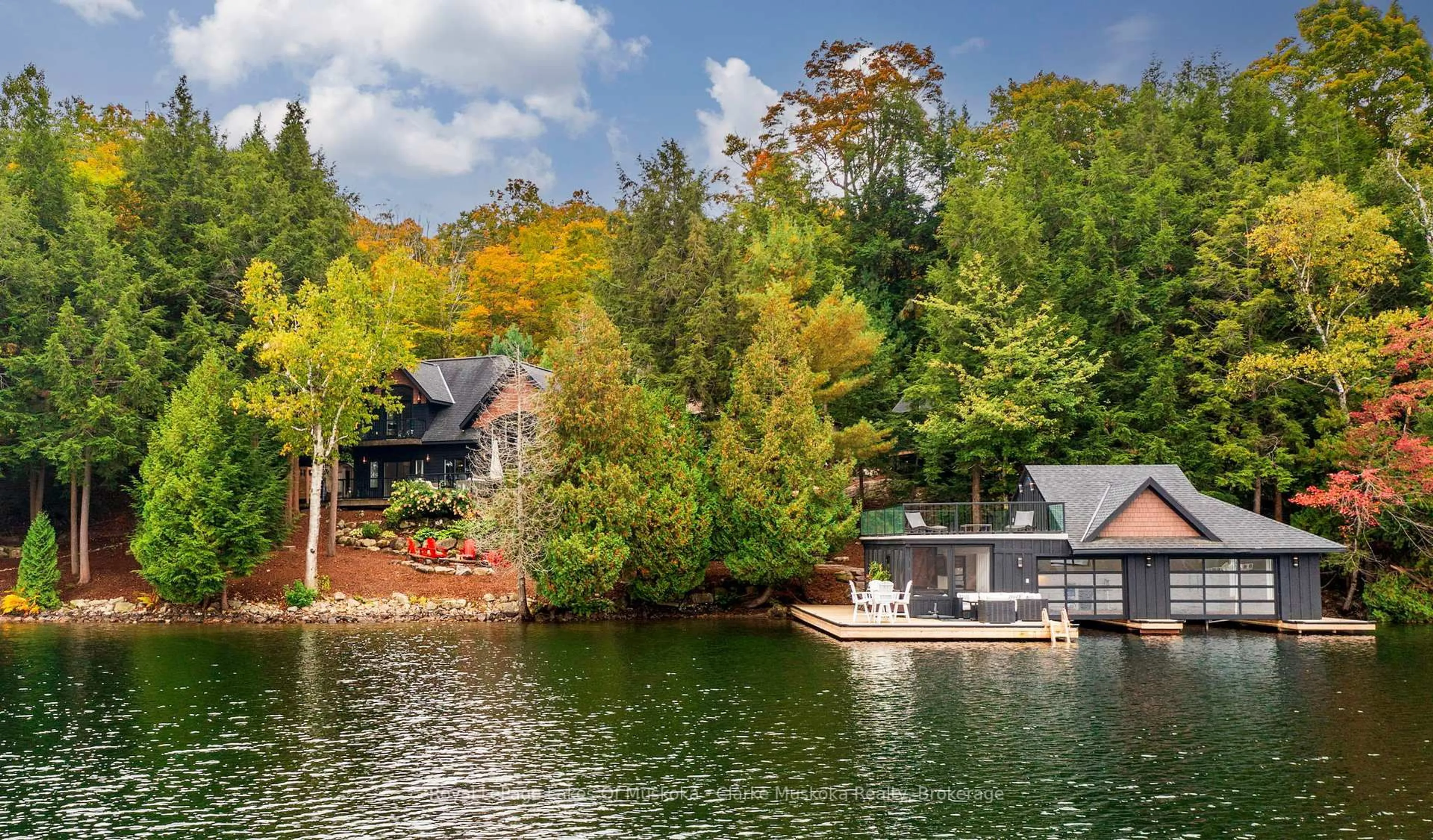 A pic from outside/outdoor area/front of a property/back of a property/a pic from drone, water/lake/river/ocean view for 1055 Chown Rd, Muskoka Lakes Ontario P0C 1H0