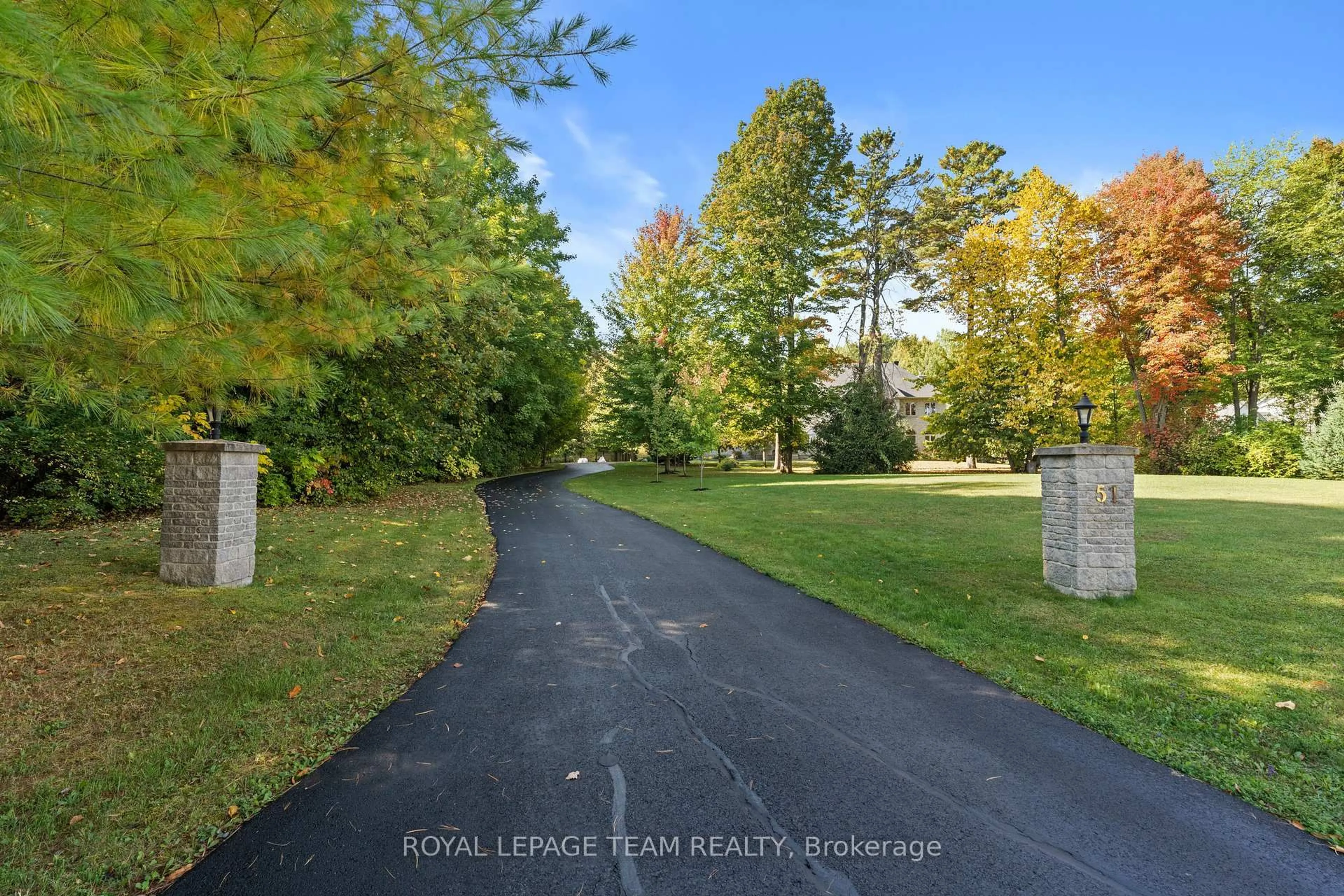 A pic from outside/outdoor area/front of a property/back of a property/a pic from drone, water/lake/river/ocean view for 51 Marchvale Dr, Ottawa Ontario K2W 1C1